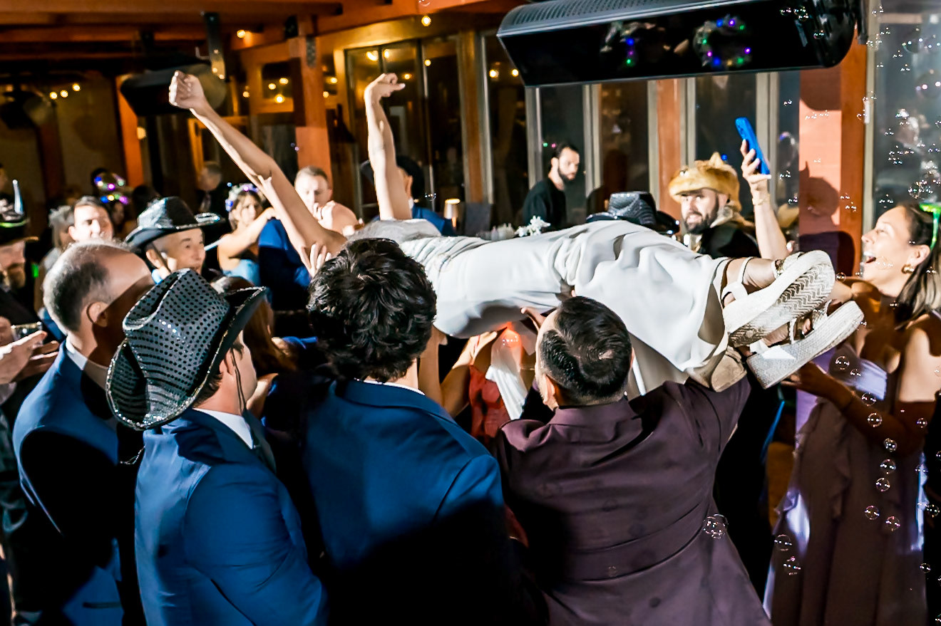 Wedding with rainbows, birds of prey, and an epic dance party at The Fort in Morrison, CO