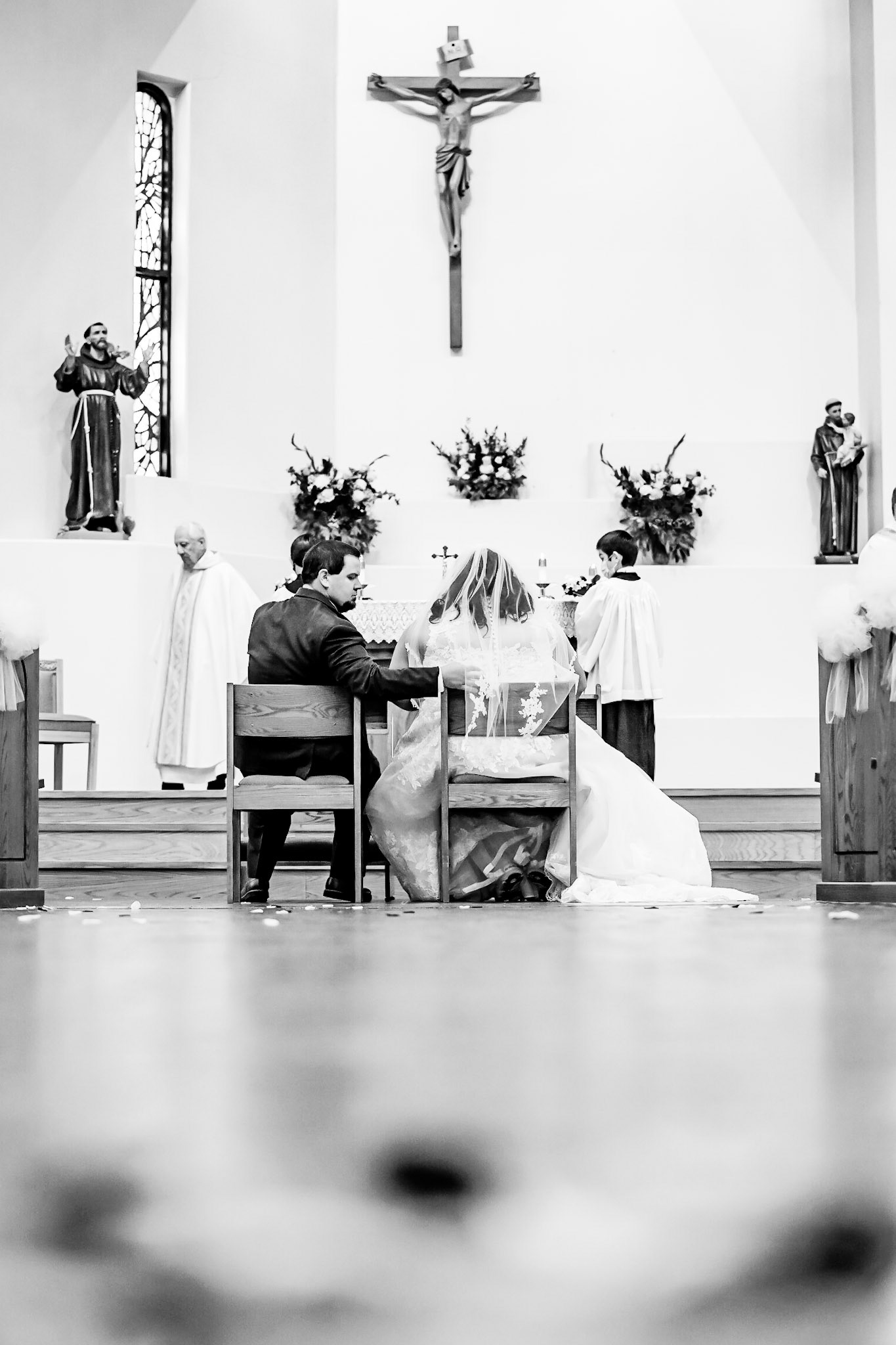 Bright and colorful wedding photography from a gorgeous Catholic Wedding Ceremony and the Sangre de Cristo Arts center in Pueblo Colorado
