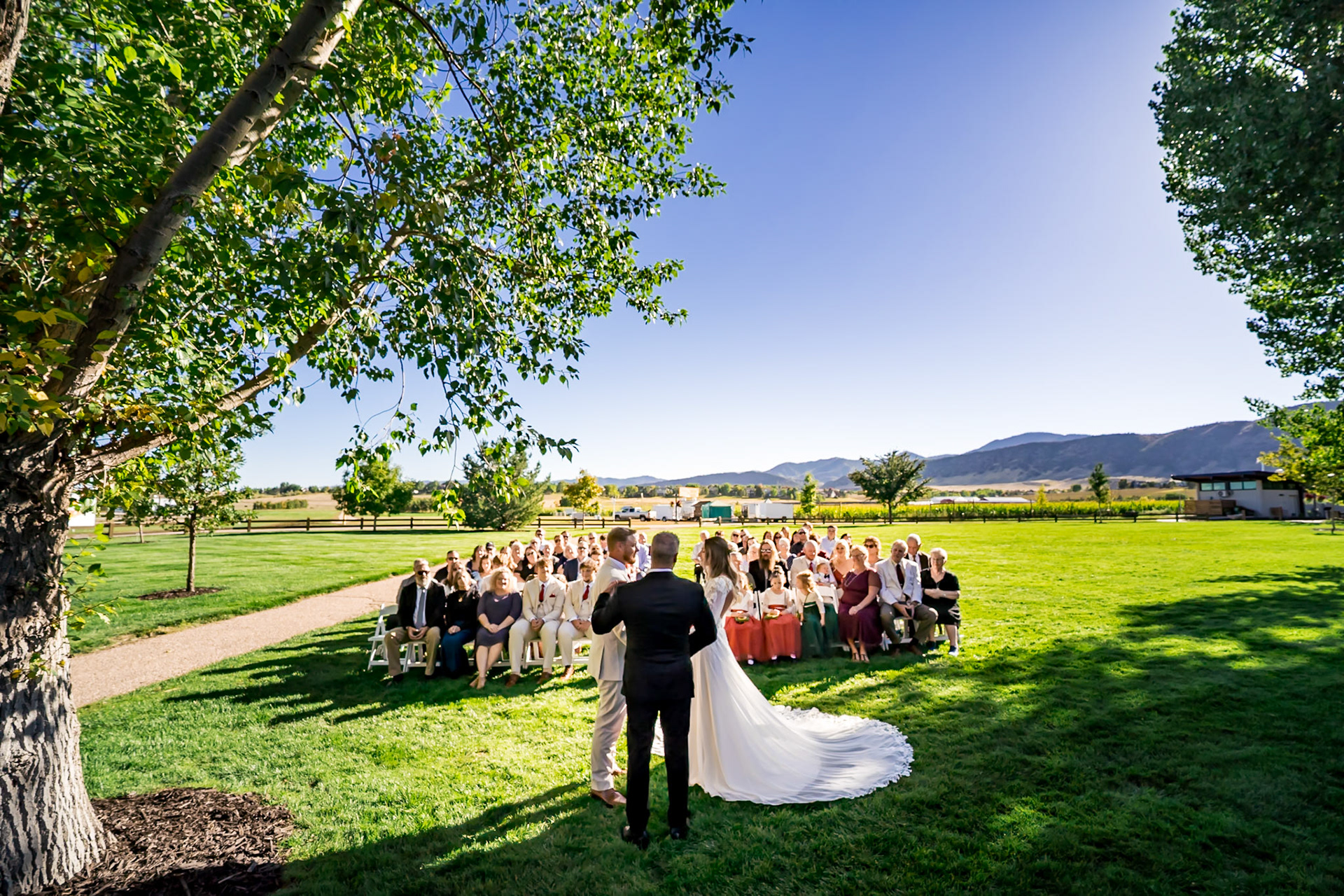 Autumn Wedding at Denver Botanic Gardens Chatfield Farms with adorable flower girls and bright sunshine