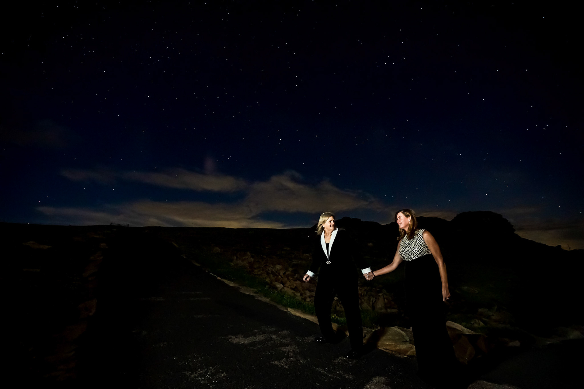 Chill, fun, LGBTQ+ pre-wedding portrait session at Stanley Hotel and Rocky Mountain National Park in Estes Park including astrophotography portraits