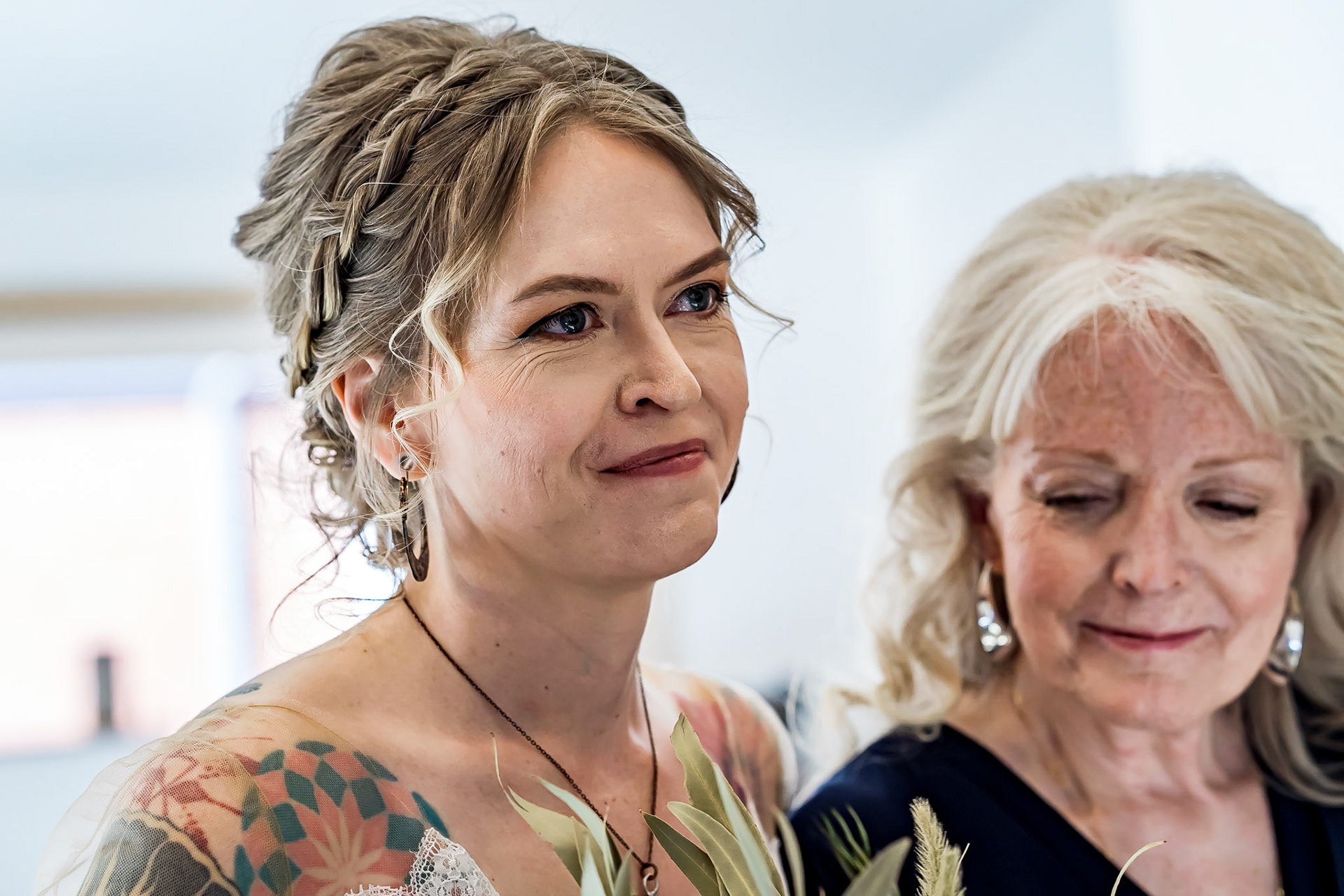 Colorful wedding at the Rembrandt Yard in Boulder, Colorado. Corgi ring bearer.