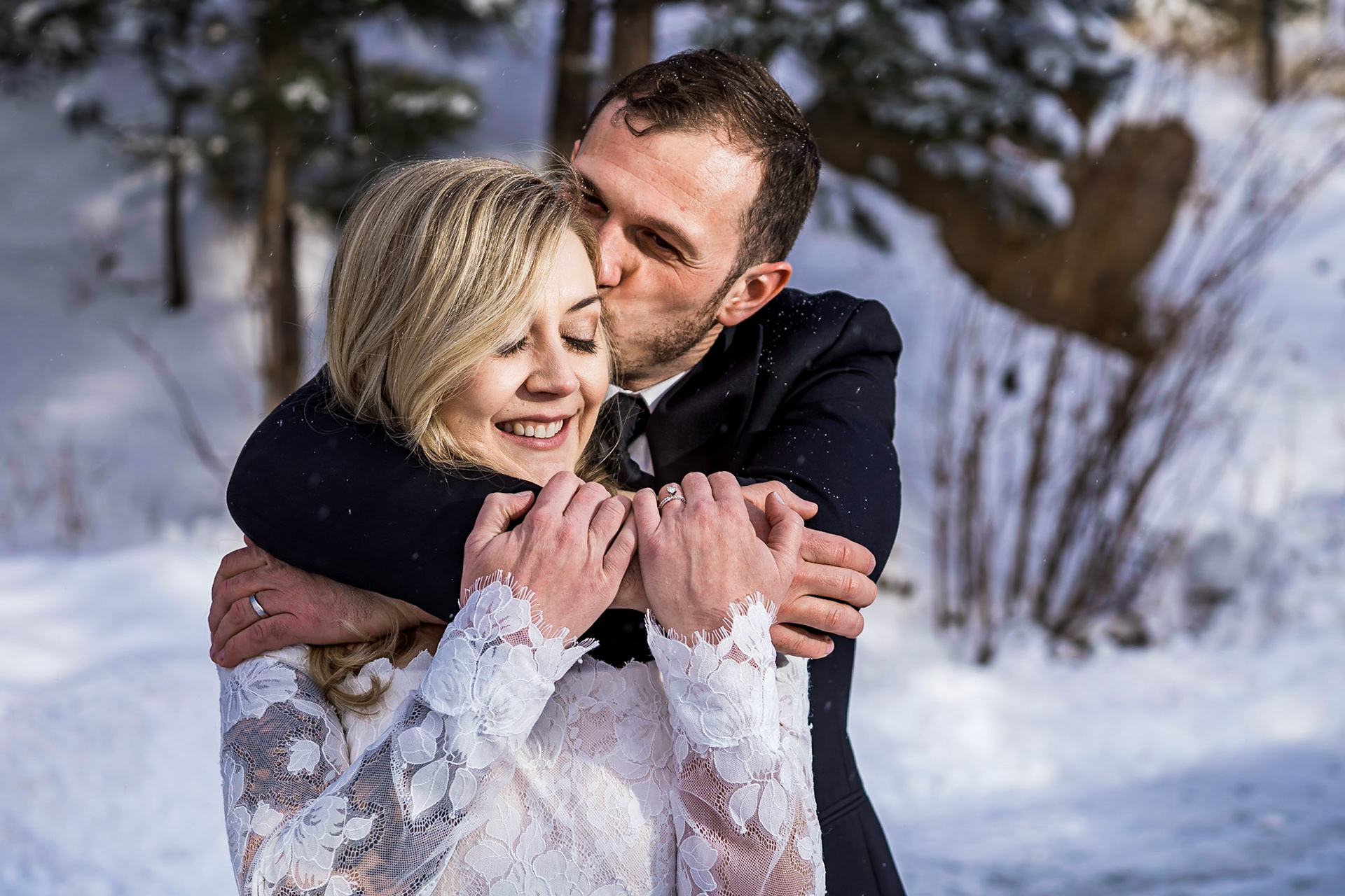 Fun, intimate winter wedding at Della Terra in Estes Park, Colorado. Reception at the Historic Park Theaters, couples portraits at The Stanley Hotel.