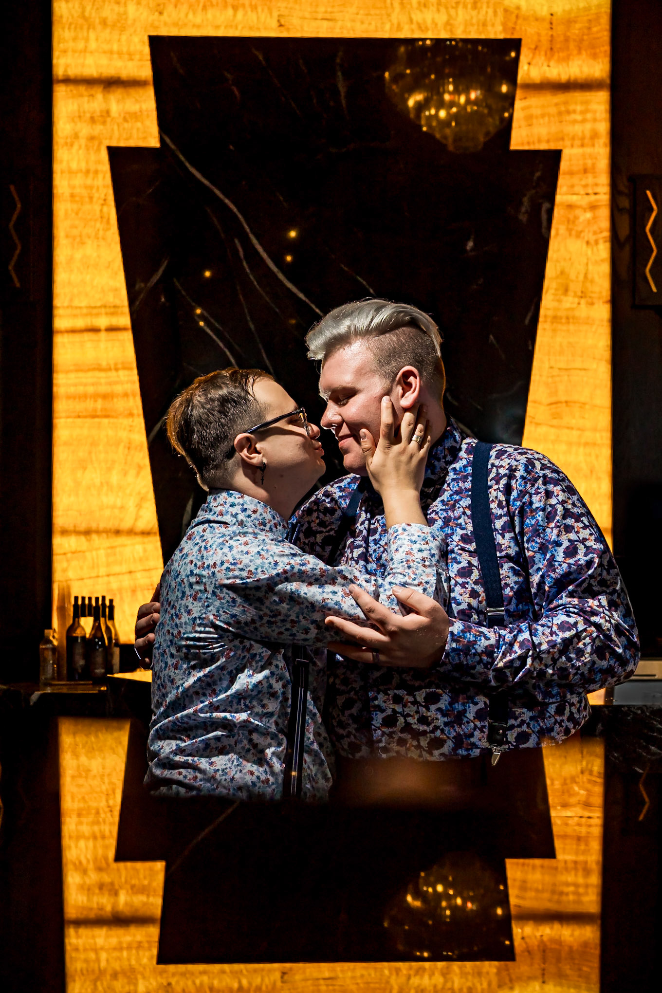 Bold, vibrant, and dramatic wedding photography at an LGBTQ+ wedding at Ironworks in Denver, Colorado