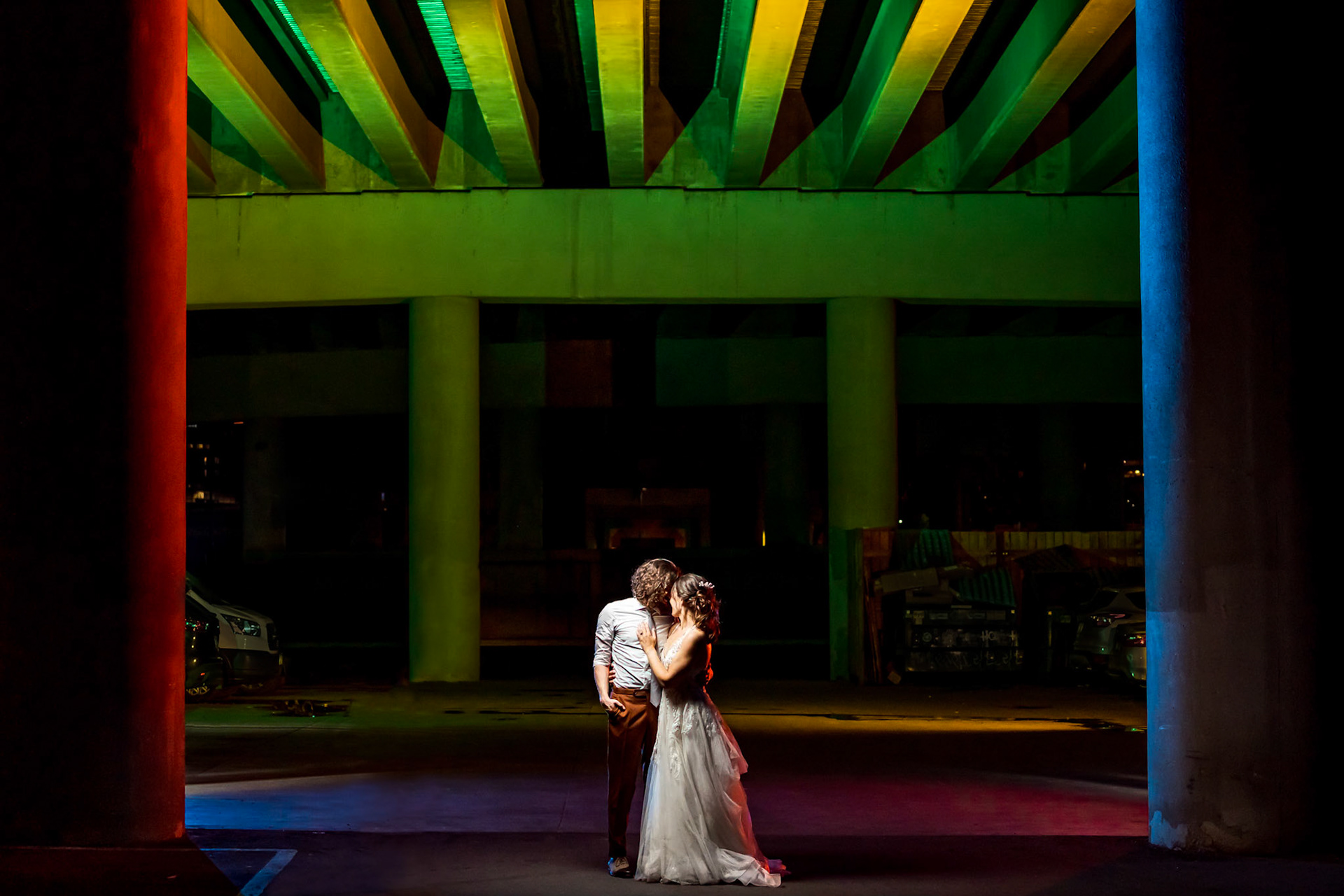 Fun, colorful, nerdy wedding with a dog ringbearer and bubble guns at Mile High Station in Denver, CO