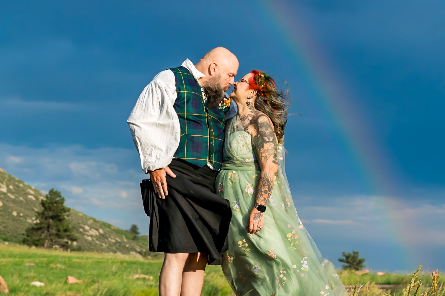 Fun and colorful wedding for a  blended family featuring lots of hairstylists! At Carter Lake in Loveland, CO