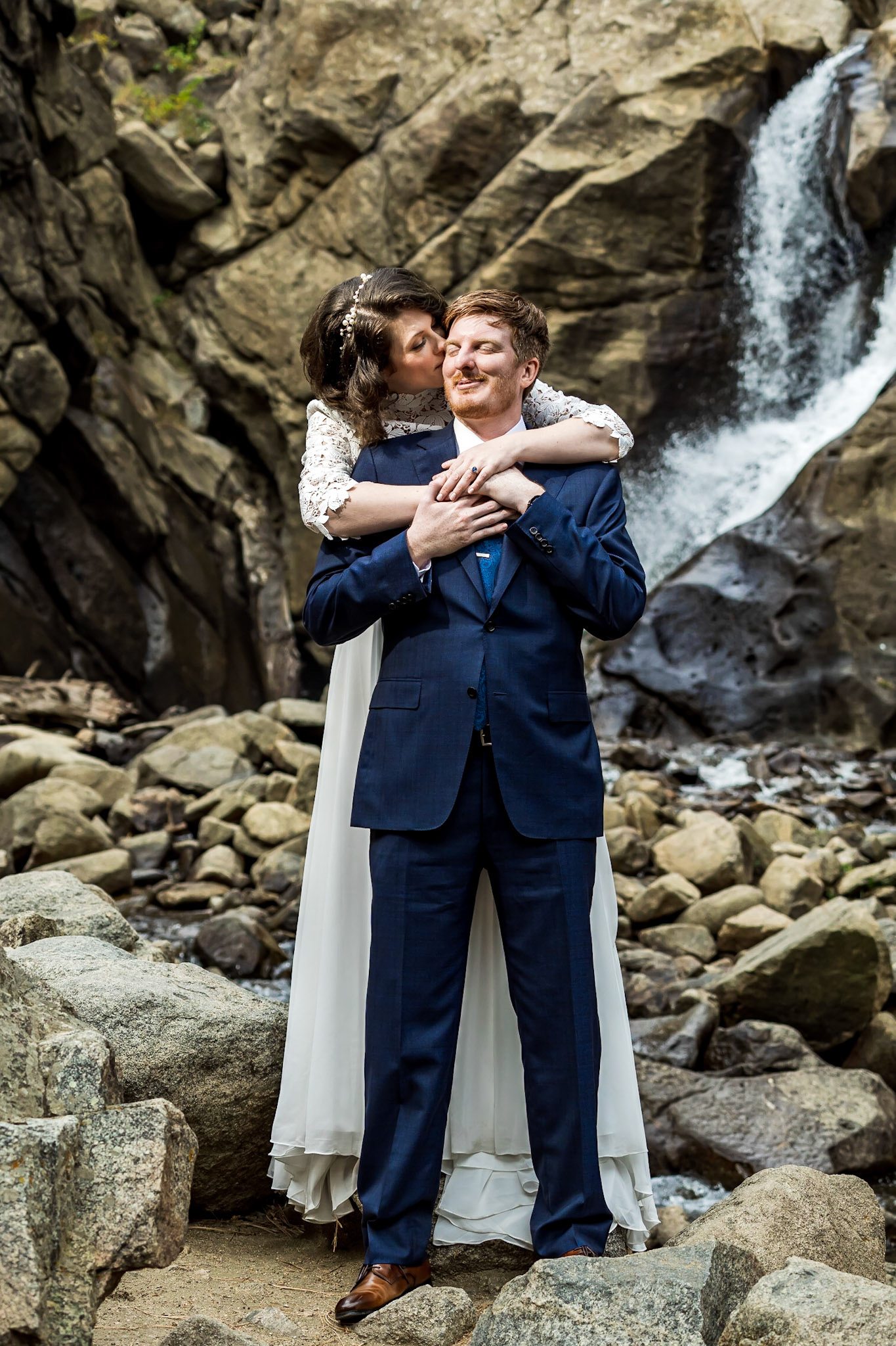 Bold and vibrant autumn wedding at the Flagstaff House in Boulder, CO with portraits at Boulder Falls.
