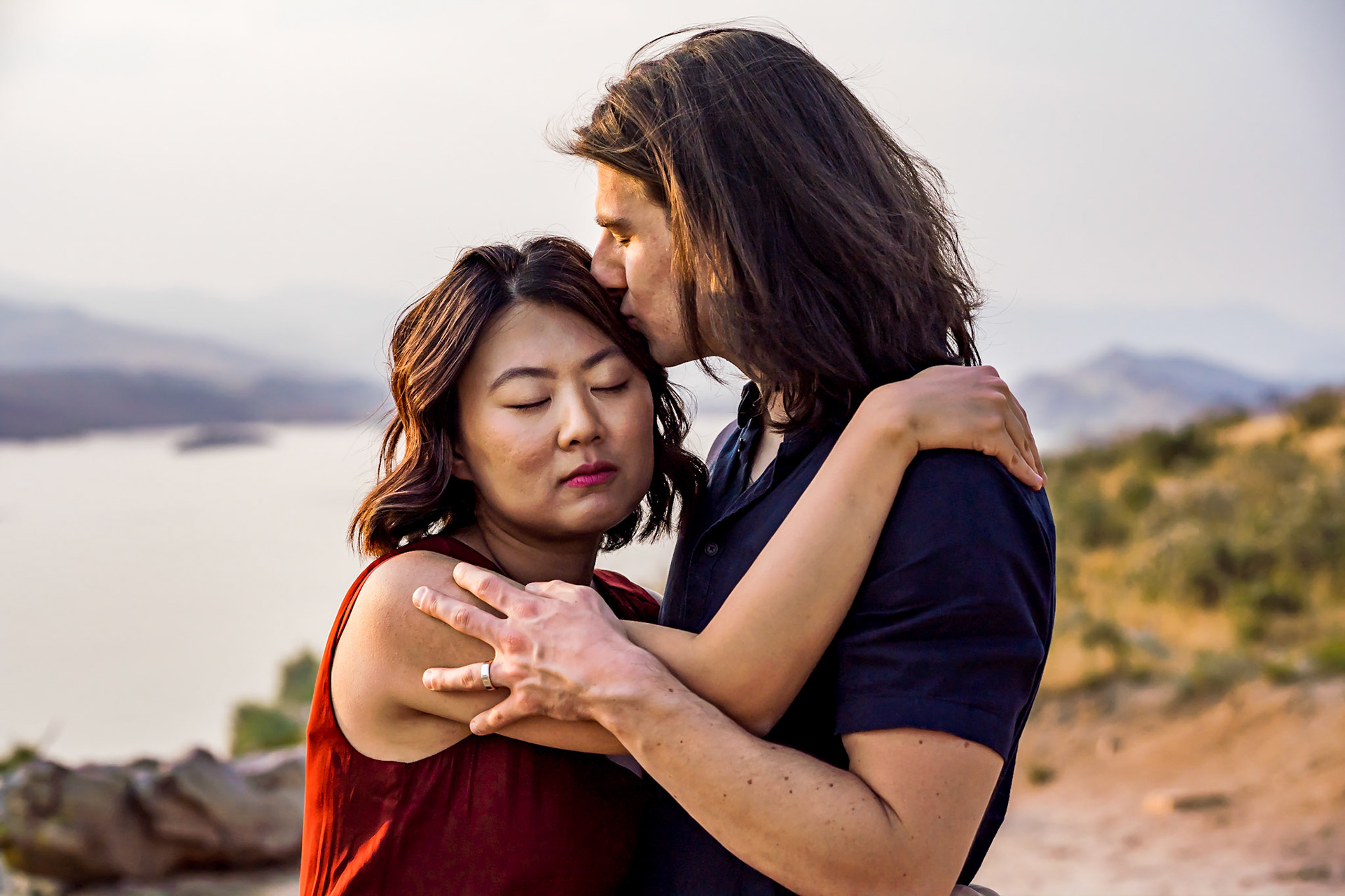 Fun, silly engagement session for a cute couple in Fort Collins Colorado. Couples Portraits at Horsetooth Reservoir.