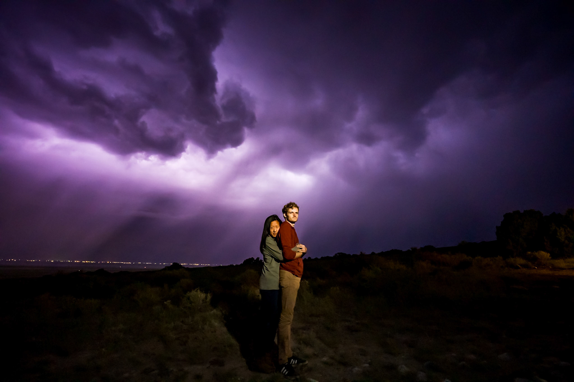 Adventure engagement session at the Great Sand Dunes in Colorado. Camping trip with husky dog. Sunrise and Sunset photos on the Dunes.