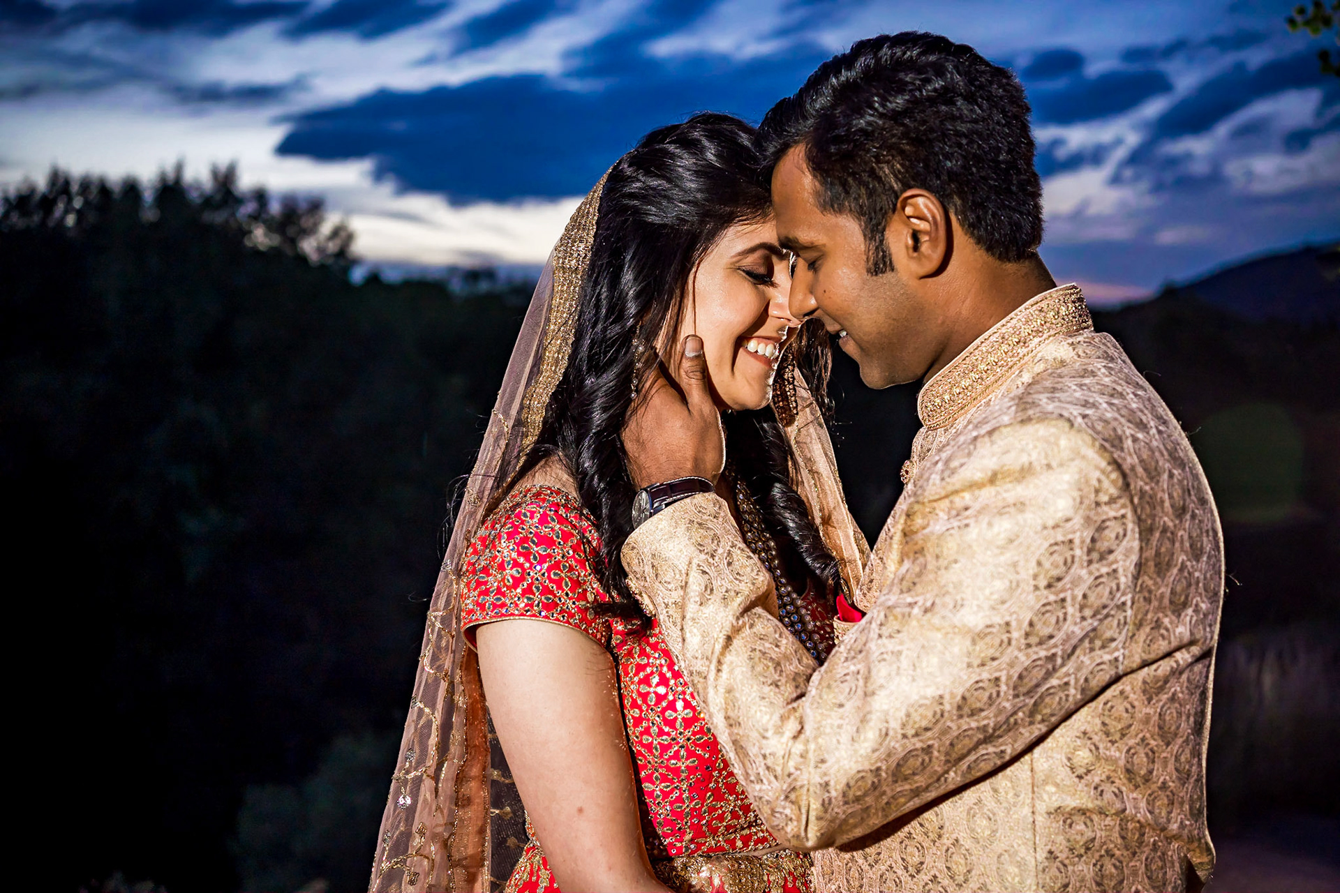 Colorful Indian wedding reception at the Aspen Meadows Resort in Aspen Colorado. Fall colors and fun dance party.