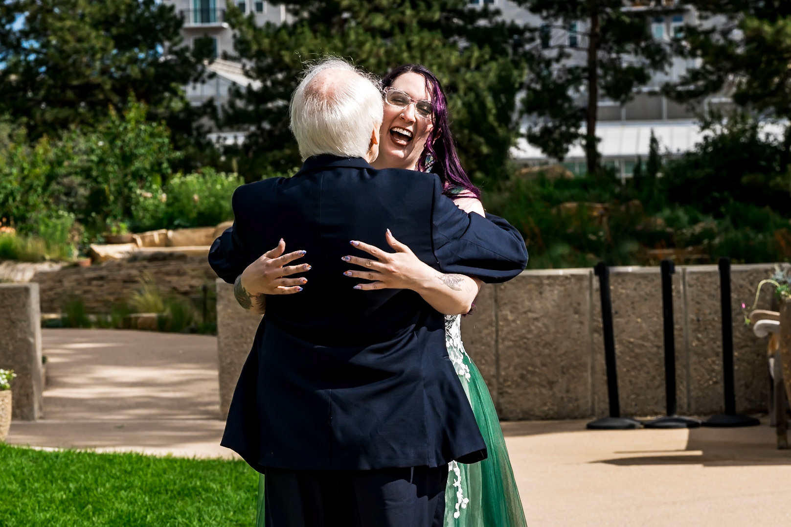 Colorful summer wedding at the solarium in Denver Botanic Gardens with a Lord of the Rings theme