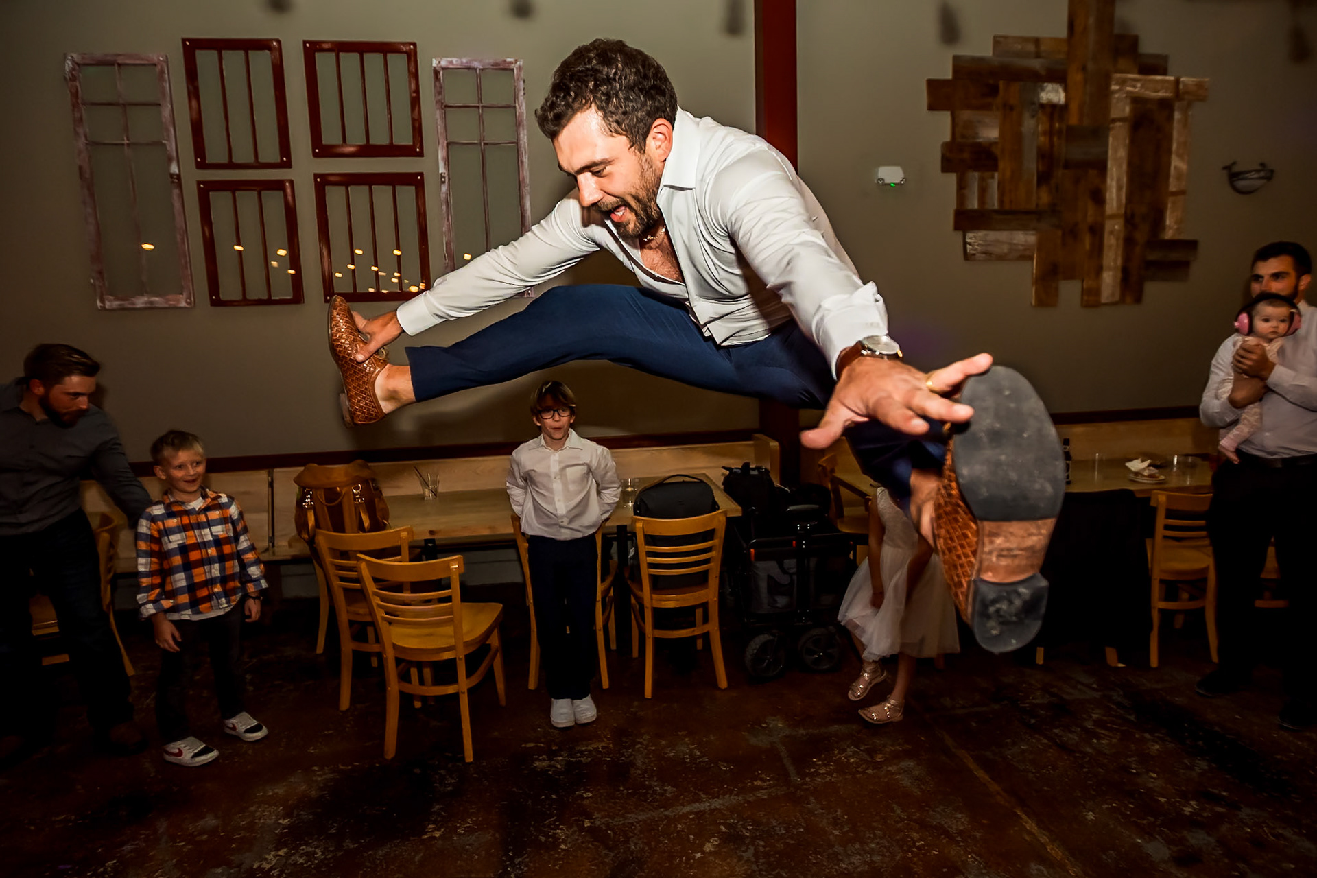 Fun, colorful, autumn wedding with children and a great dance party at 2 Penguins in Centennial, Colorado