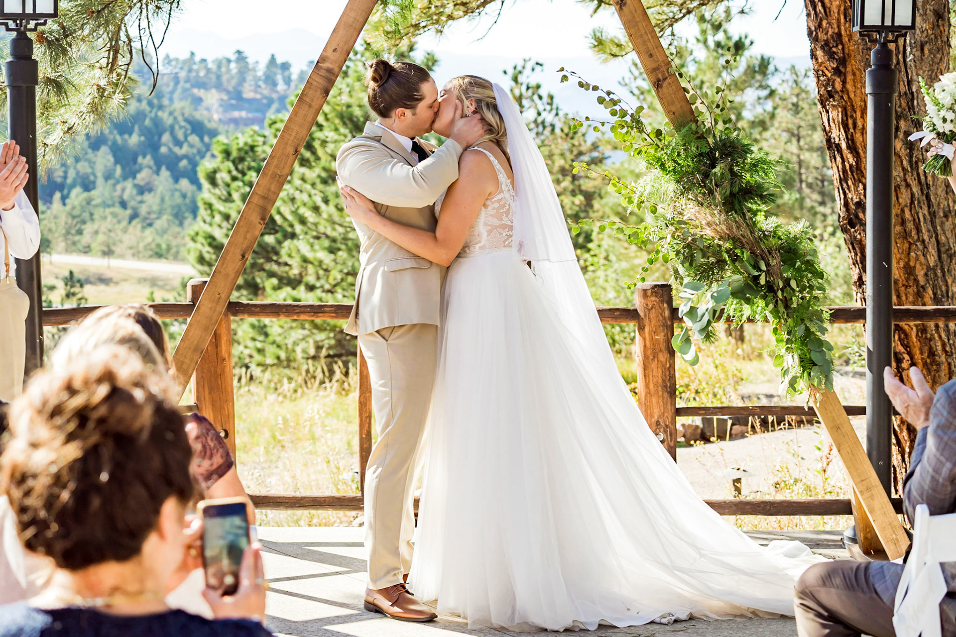 Colorful, bright, and fun wedding with a dog ring bearer at the Chief Hosa Lodge in Golden, CO