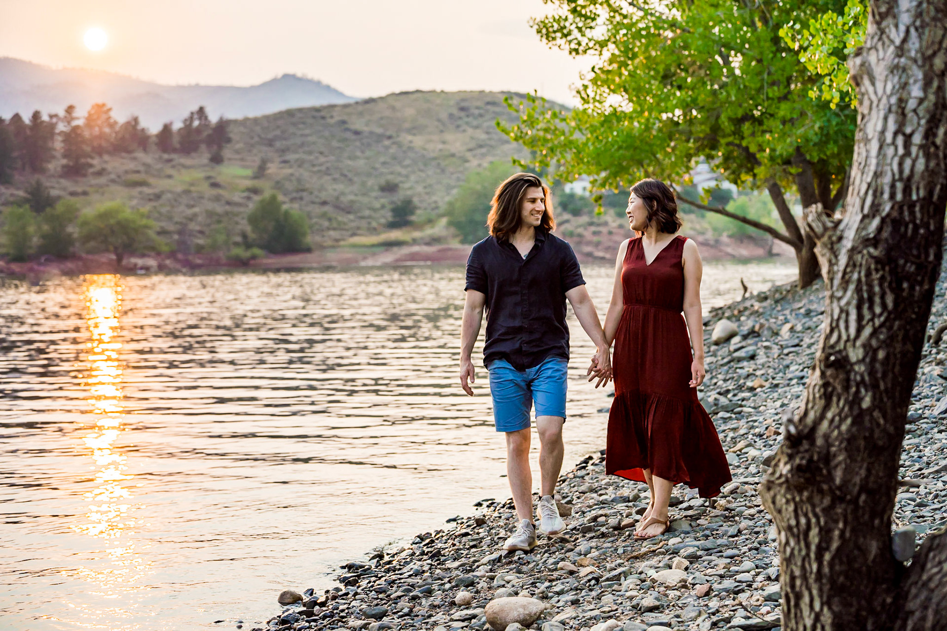 Fun, silly engagement session for a cute couple in Fort Collins Colorado. Couples Portraits at Horsetooth Reservoir.