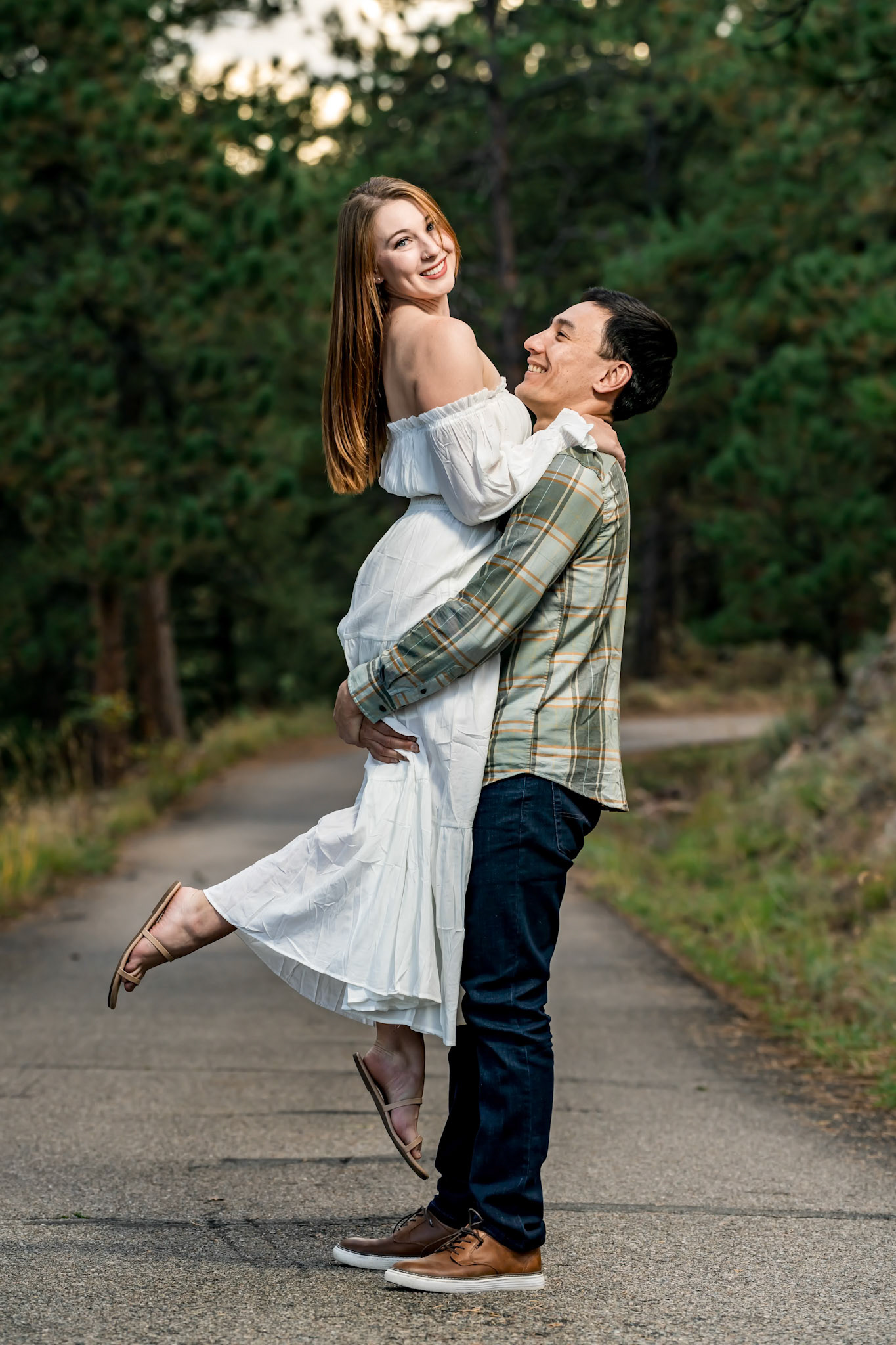 Cute engagement session with a dog at Sunrise Amphitheater in Boulder, CO