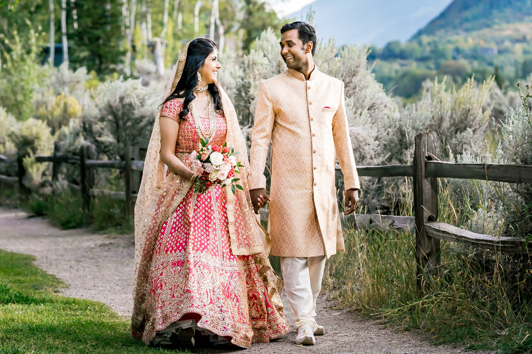 Colorful Indian wedding reception at the Aspen Meadows Resort in Aspen Colorado. Fall colors and fun dance party.