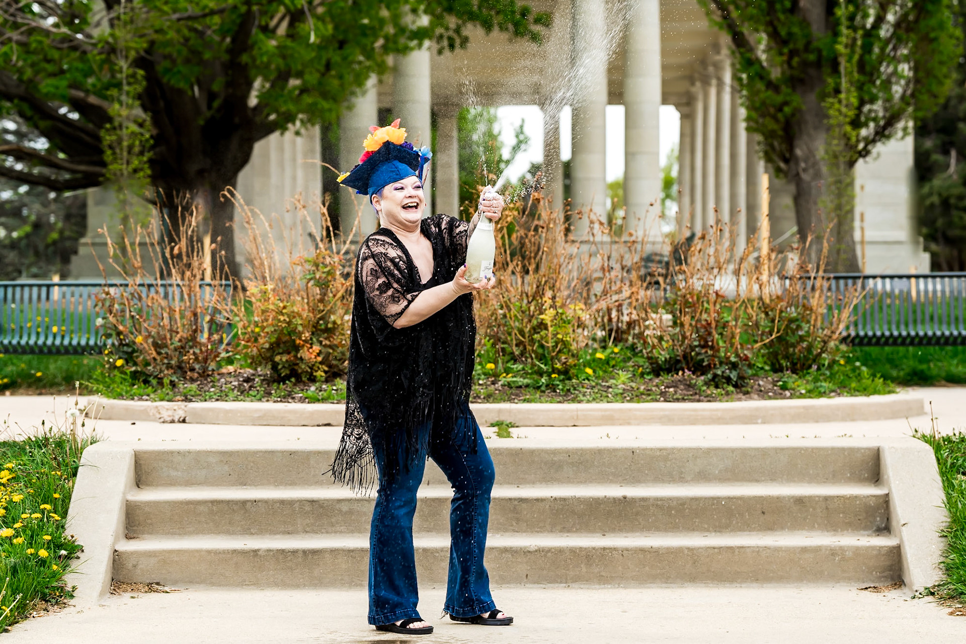 Graduation portraits for a breast cancer survivor at Metro State University in Denver, Colorado.