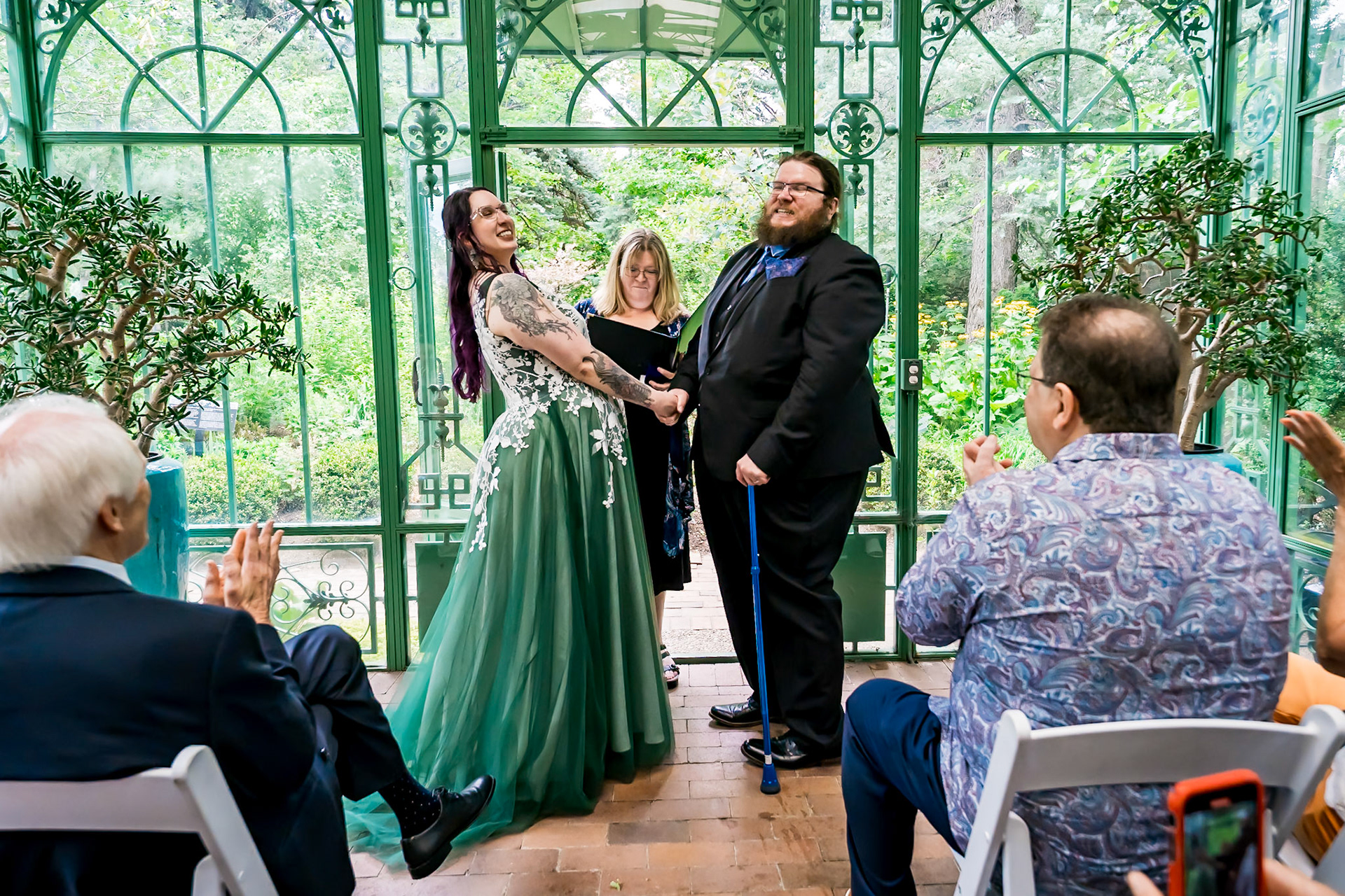 Colorful summer wedding at the solarium in Denver Botanic Gardens with a Lord of the Rings theme