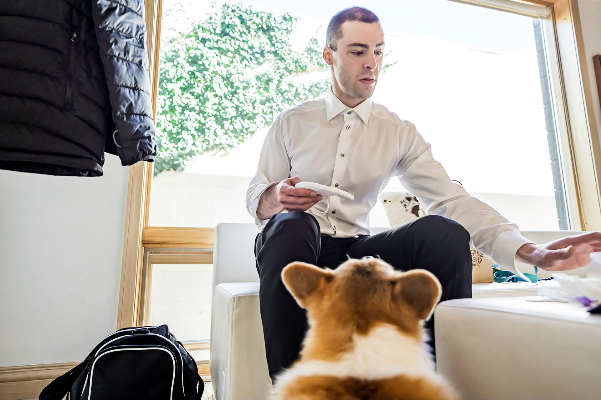Colorful wedding at the Rembrandt Yard in Boulder, Colorado. Corgi ring bearer.
