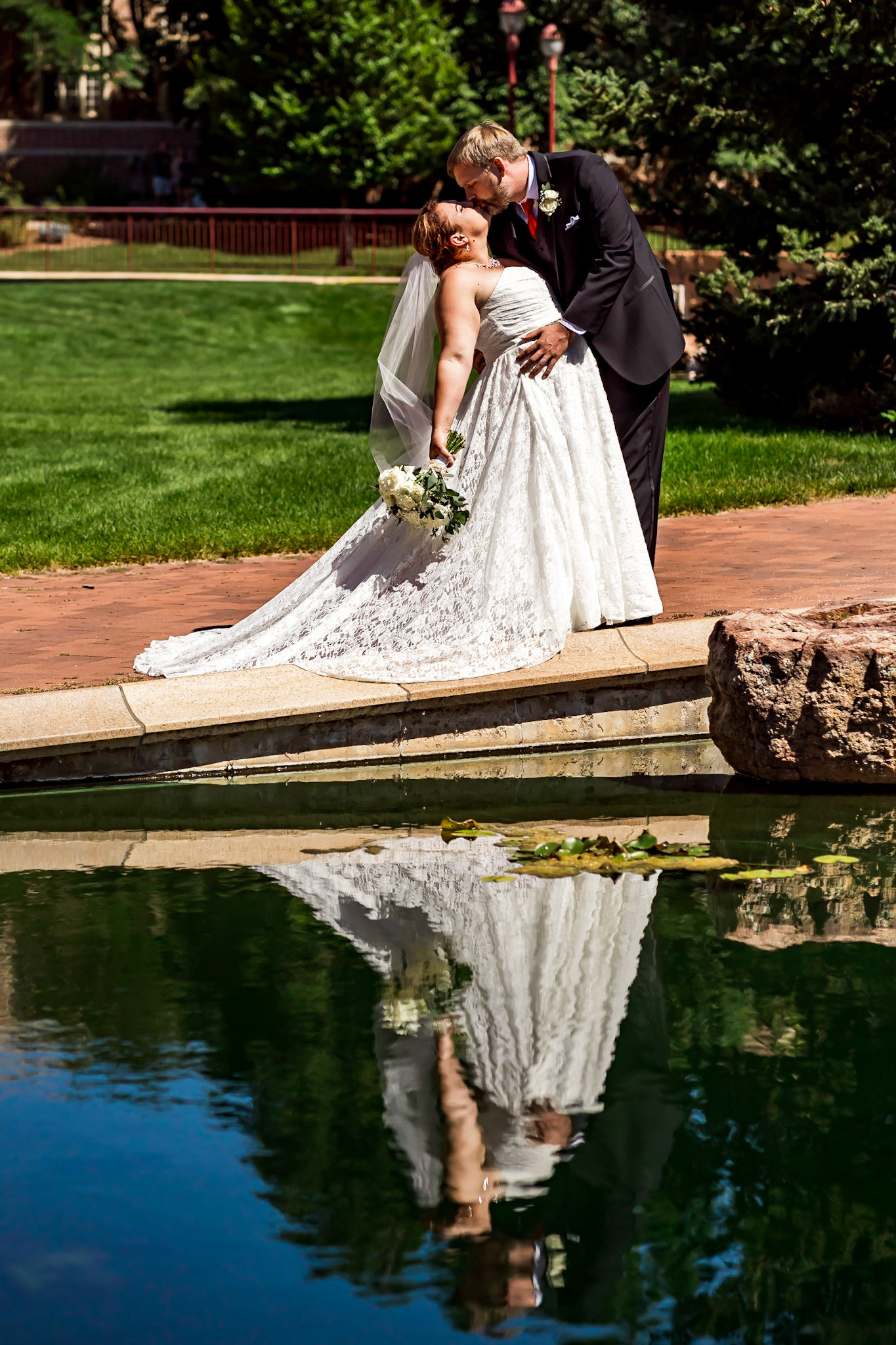 Fun and chill wedding at the Knoebel Events Center in Denver, Colorado featuring an adorable toddler ringbearer