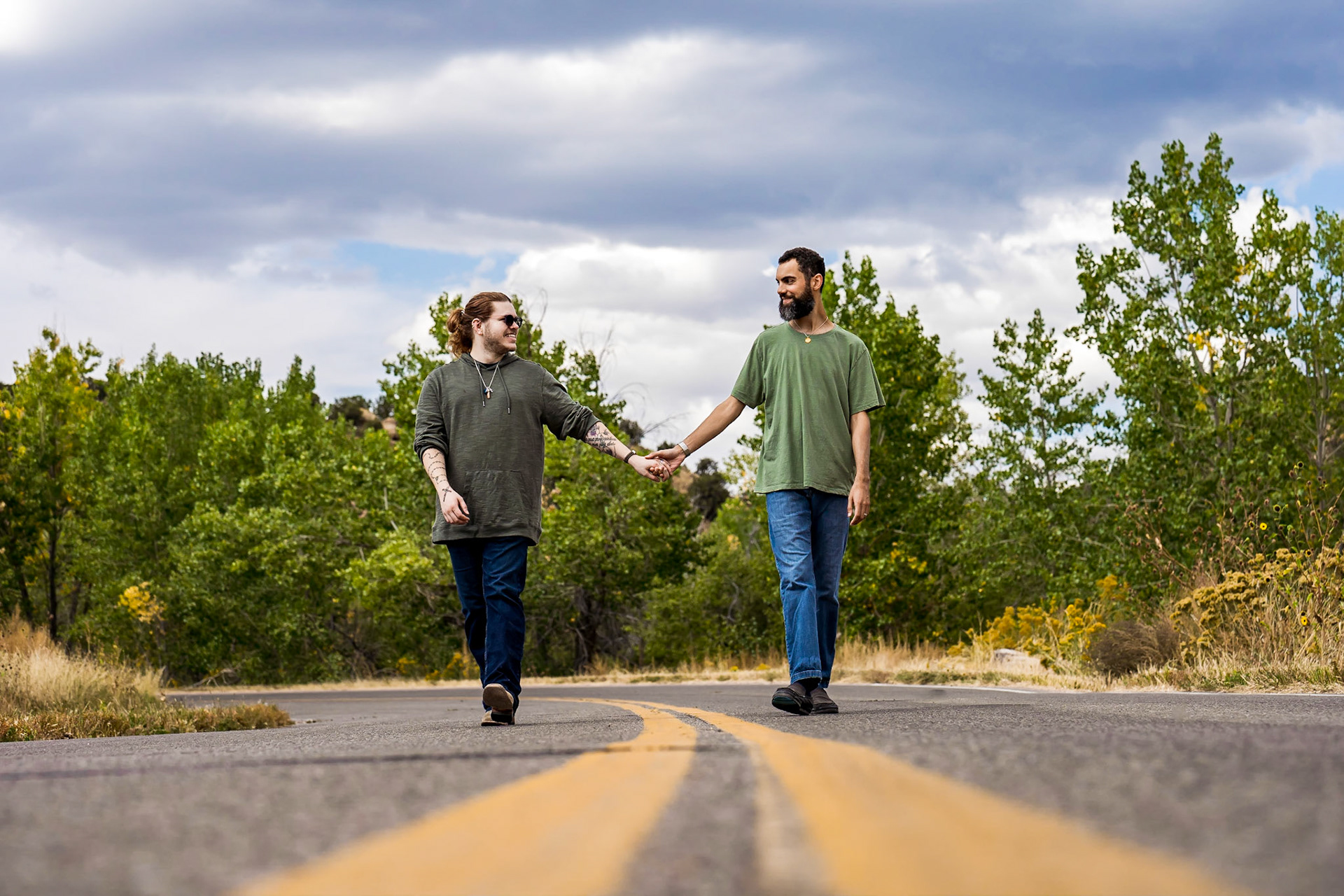 LGBTQ Adventure engagement session in Canon City Colorado. Photos at trailheads, a winery, and the Royal Gorge.