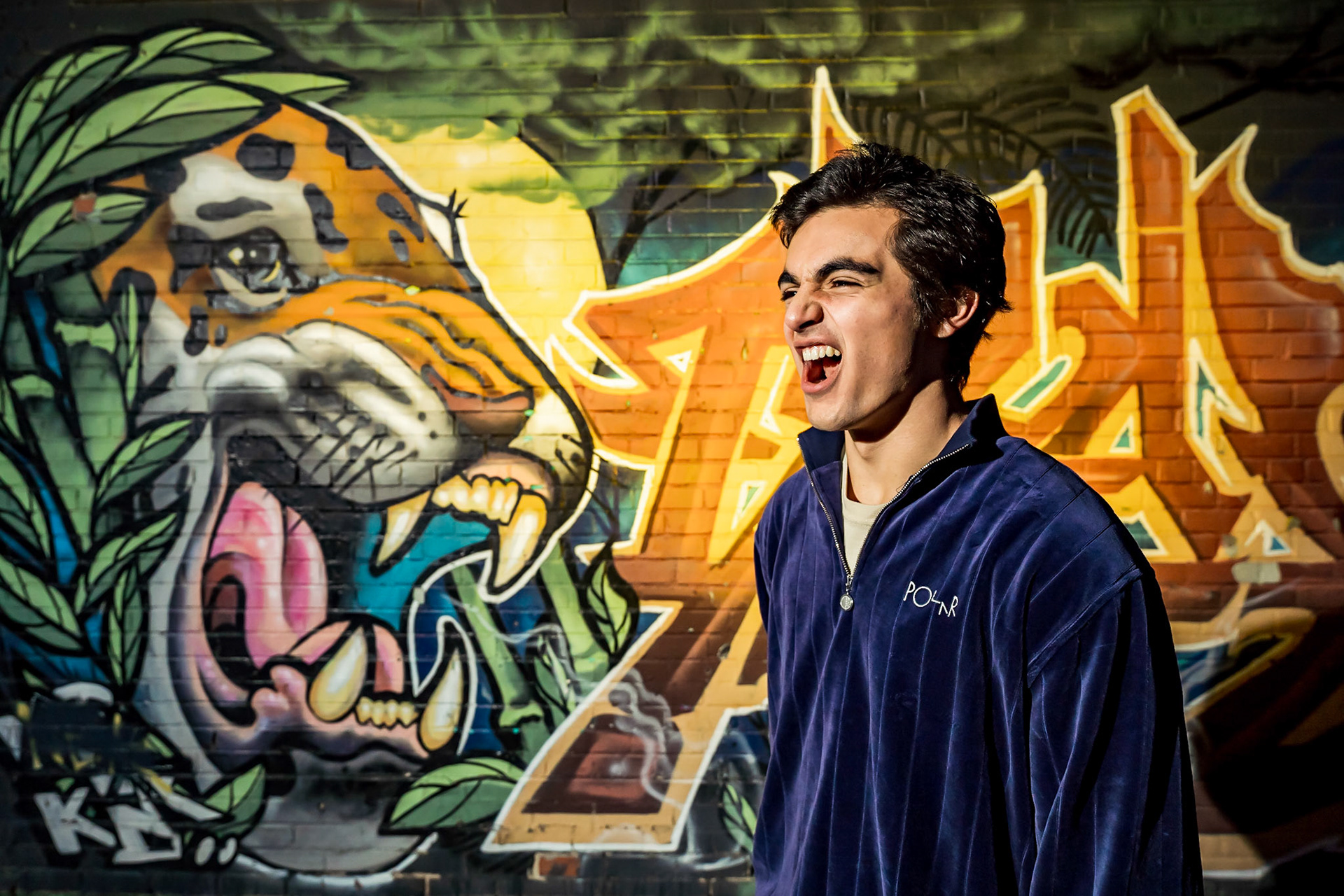High school senior portraits with street art in RINO, Denver, CO