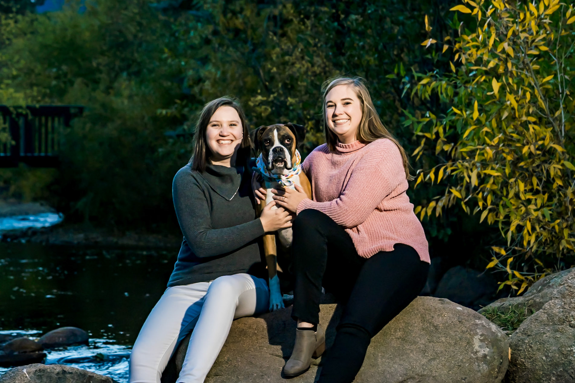 Engagement session in Estes Park Colorado with two beautiful ladies and their dog. Portraits at the Stanley Hotel