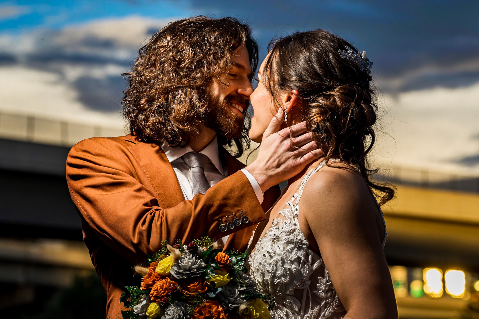 Fun, colorful, nerdy wedding with a dog ringbearer and bubble guns at Mile High Station in Denver, CO