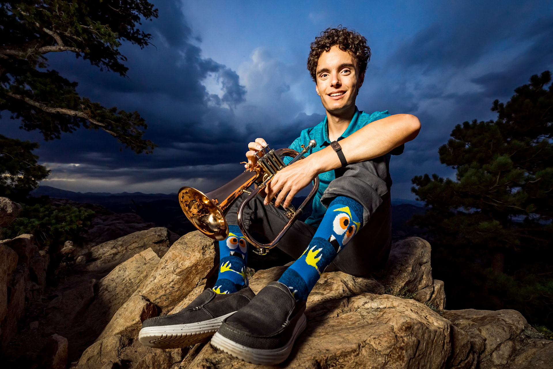 Bold and colorful high school senior portraits for a trumpet player at Lost Gulch Overlook in Boulder, CO