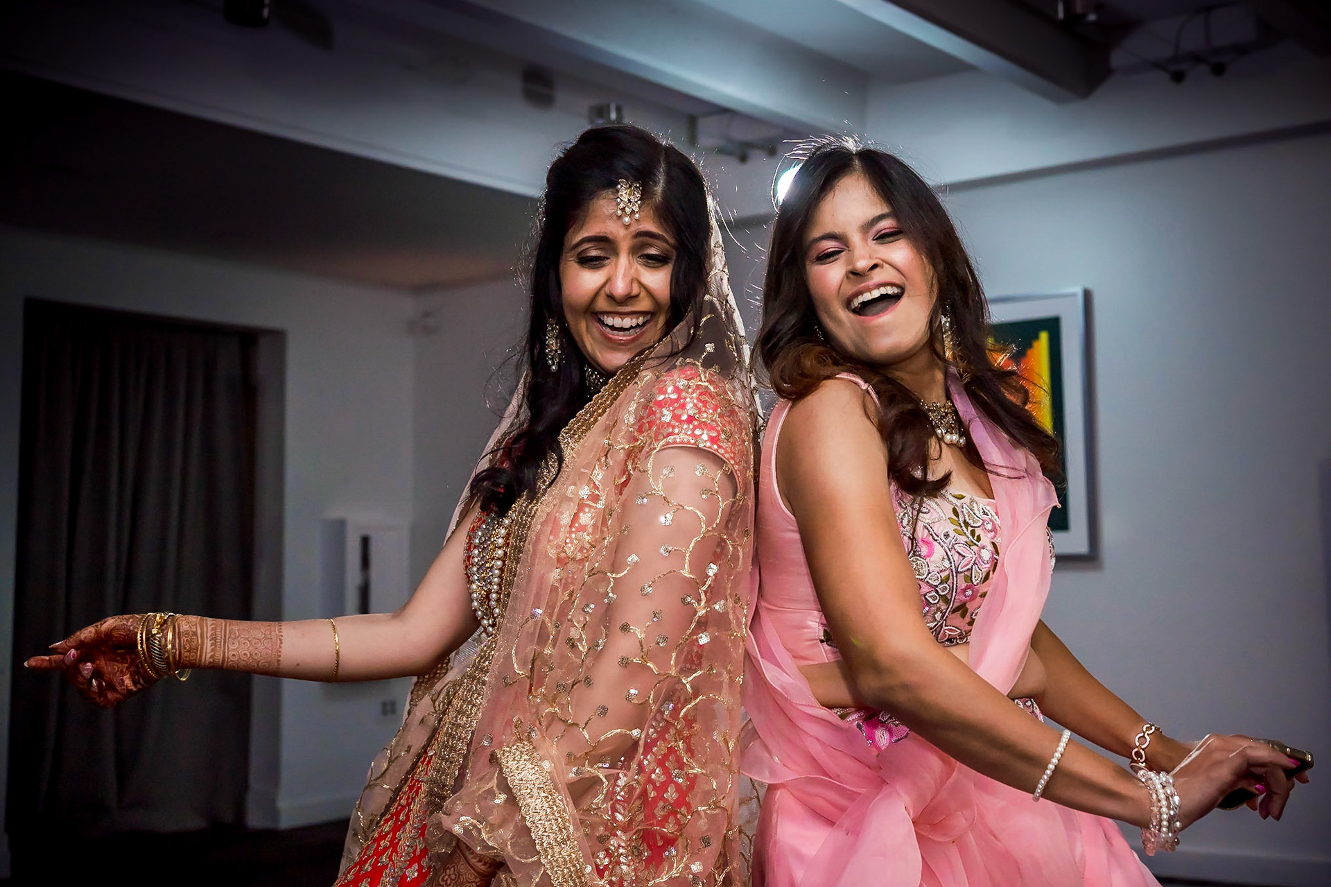 Colorful Indian wedding reception at the Aspen Meadows Resort in Aspen Colorado. Fall colors and fun dance party.