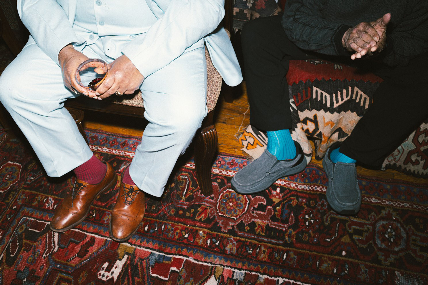 2 men sitting on couch filmed on 35mm film in NYC