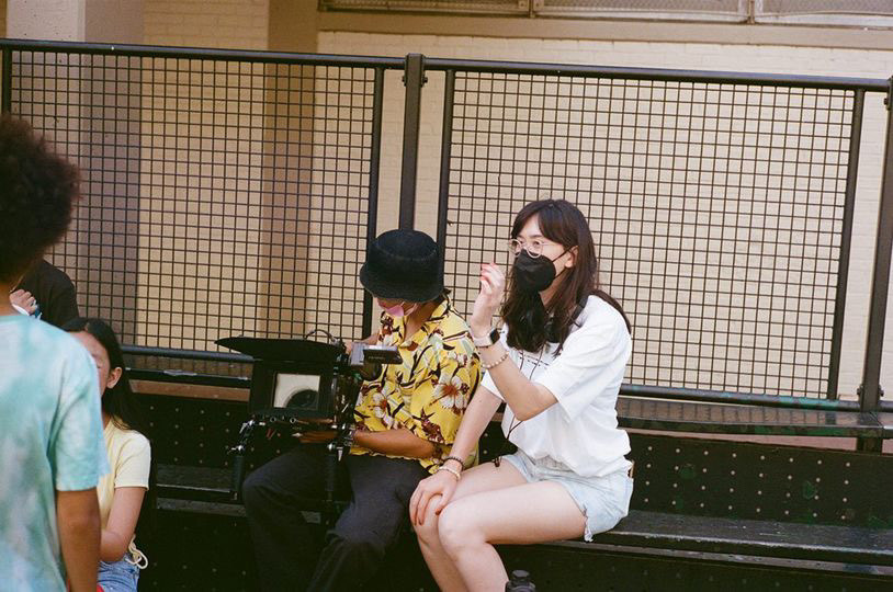 Michael Cong (DP) and Holly M. Kaplan (Director)