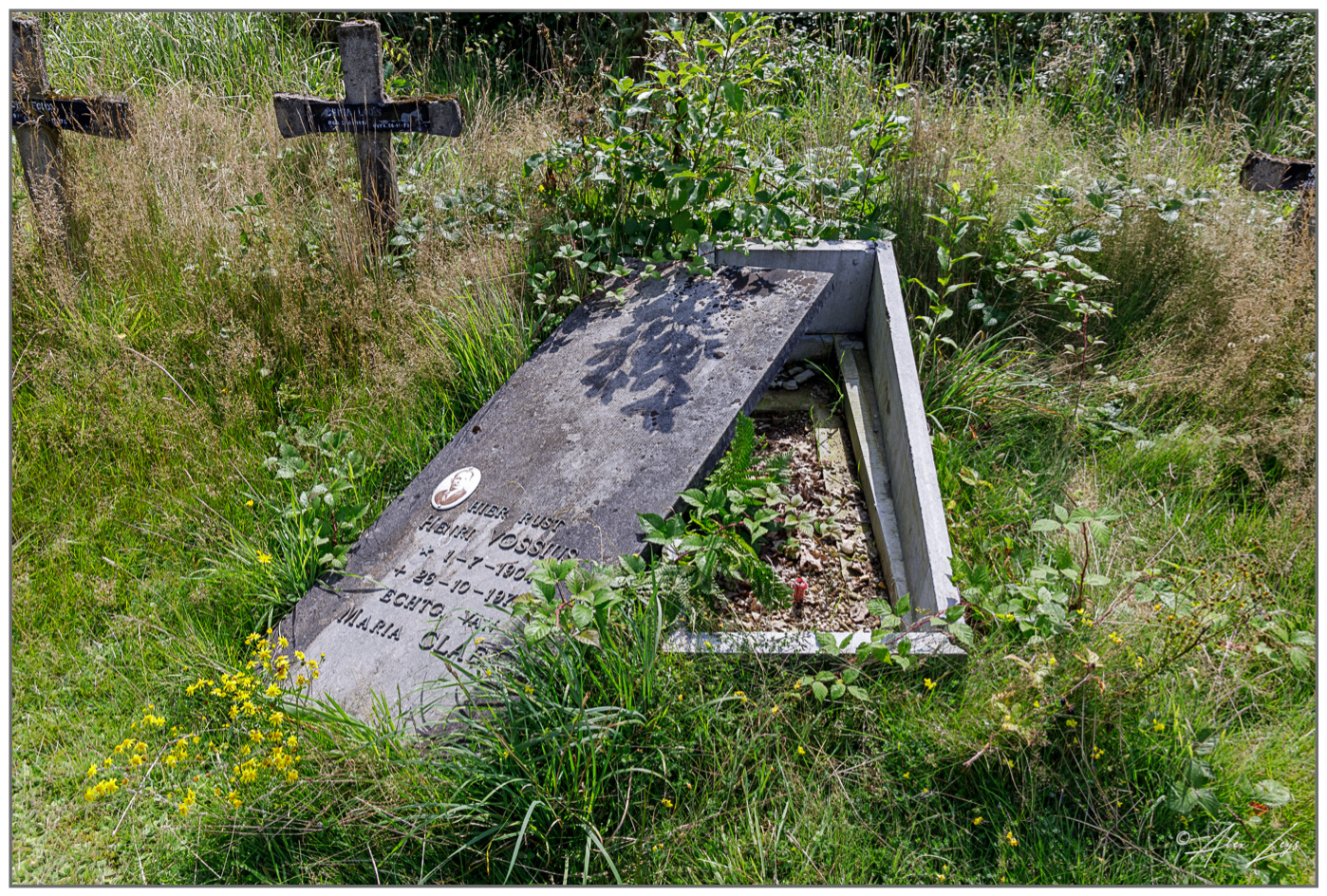Open gravestone in an abandoned graveyard