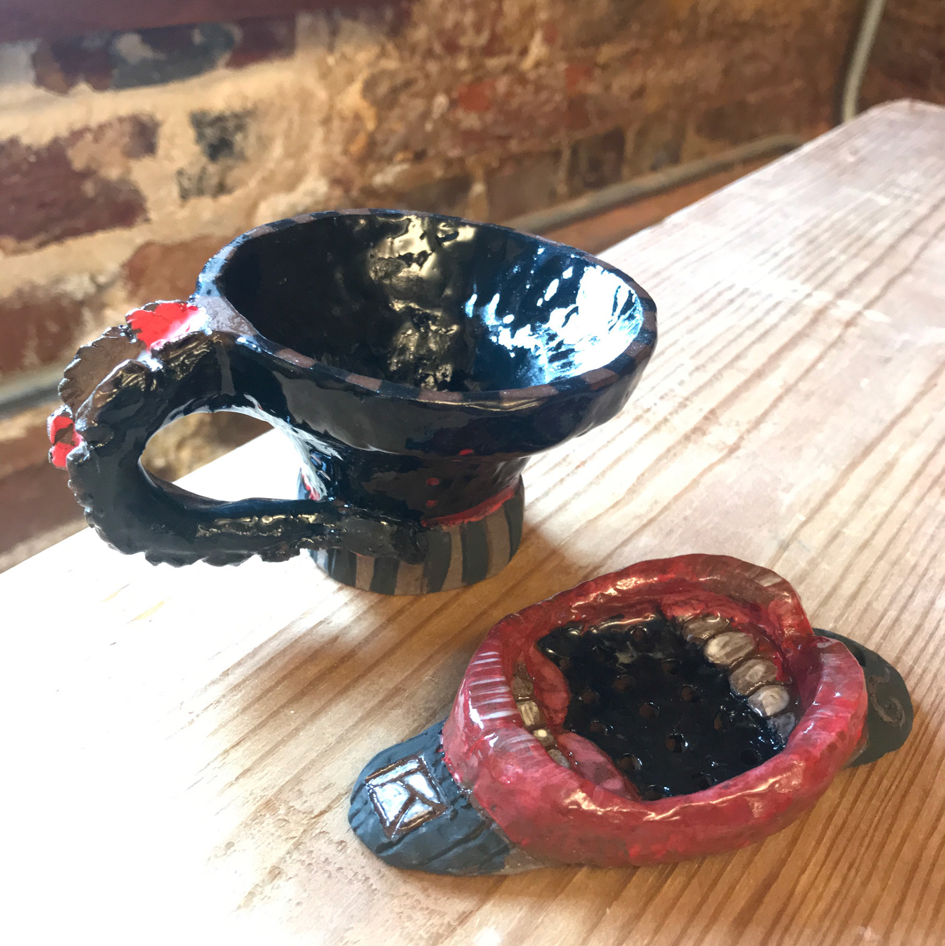 Bayou teacup and tea strainer