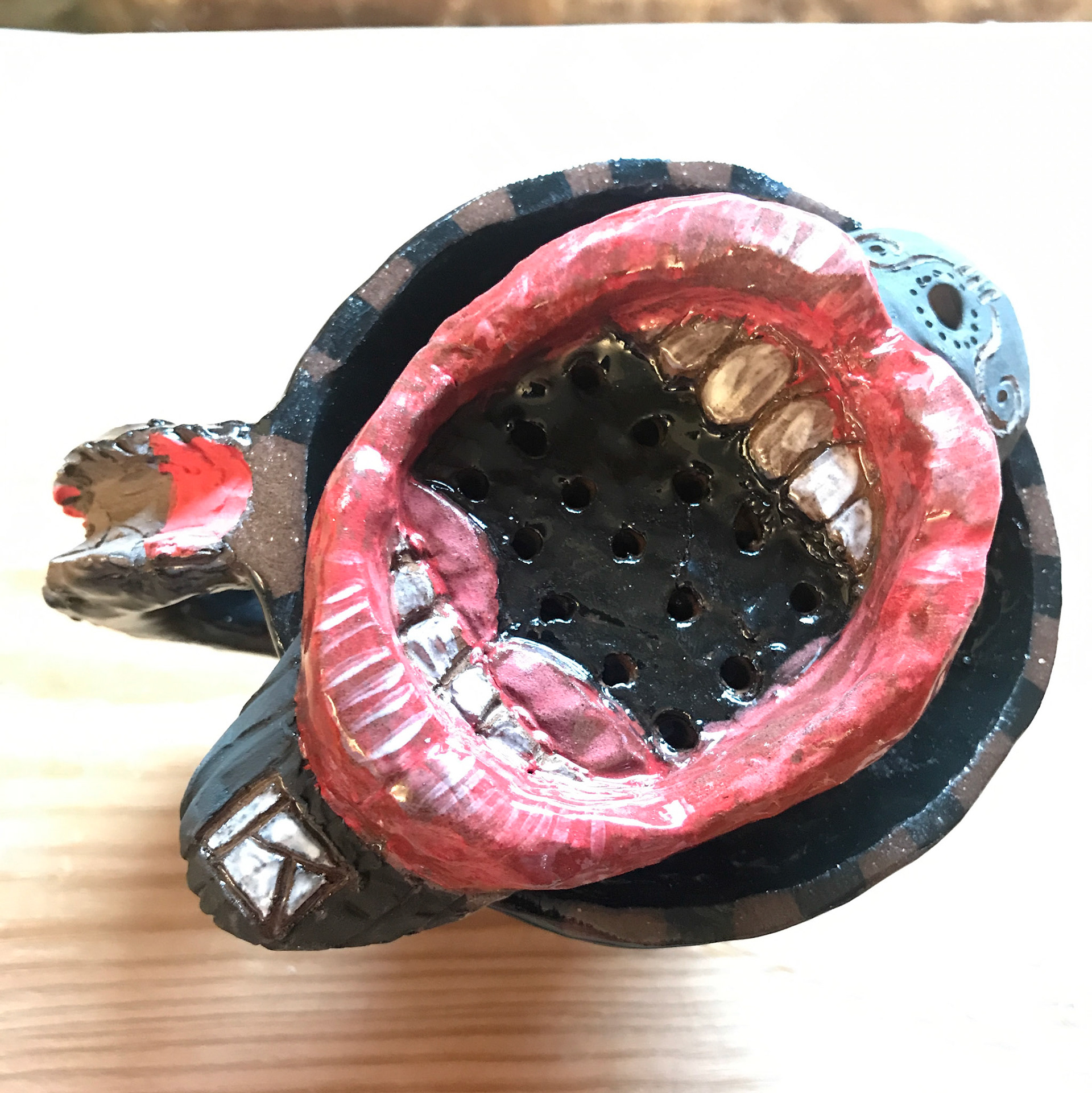 Bayou teacup and tea strainer