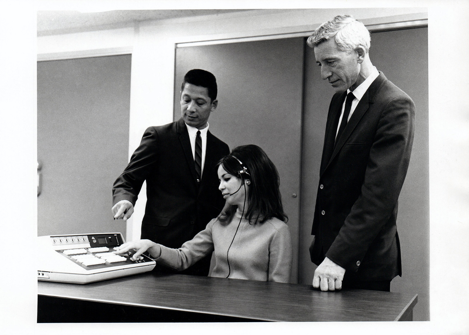 Businessman F. E. Gallardo, UCLA, Los Angeles, California, with Supervisor and a trainee