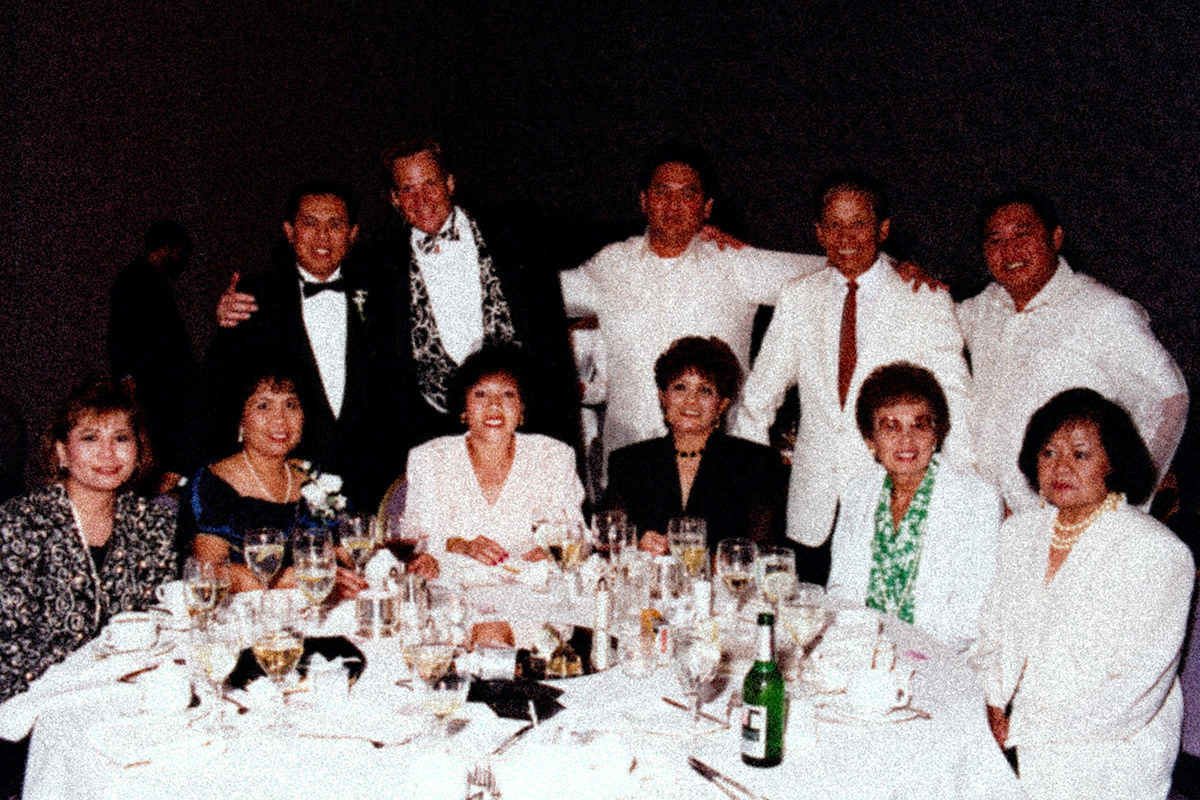 Celebration dinner, Philippines, Fred (red tie), Nita (green blouse)