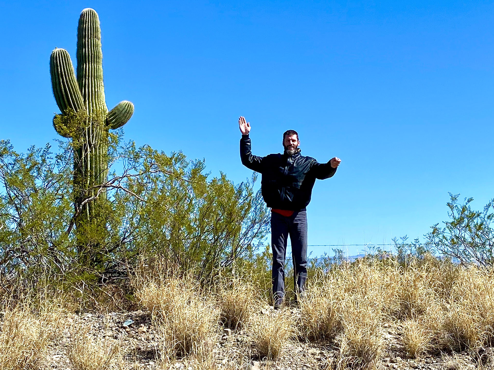 Had to stop at my first big cactus and do my best cactus imitation!