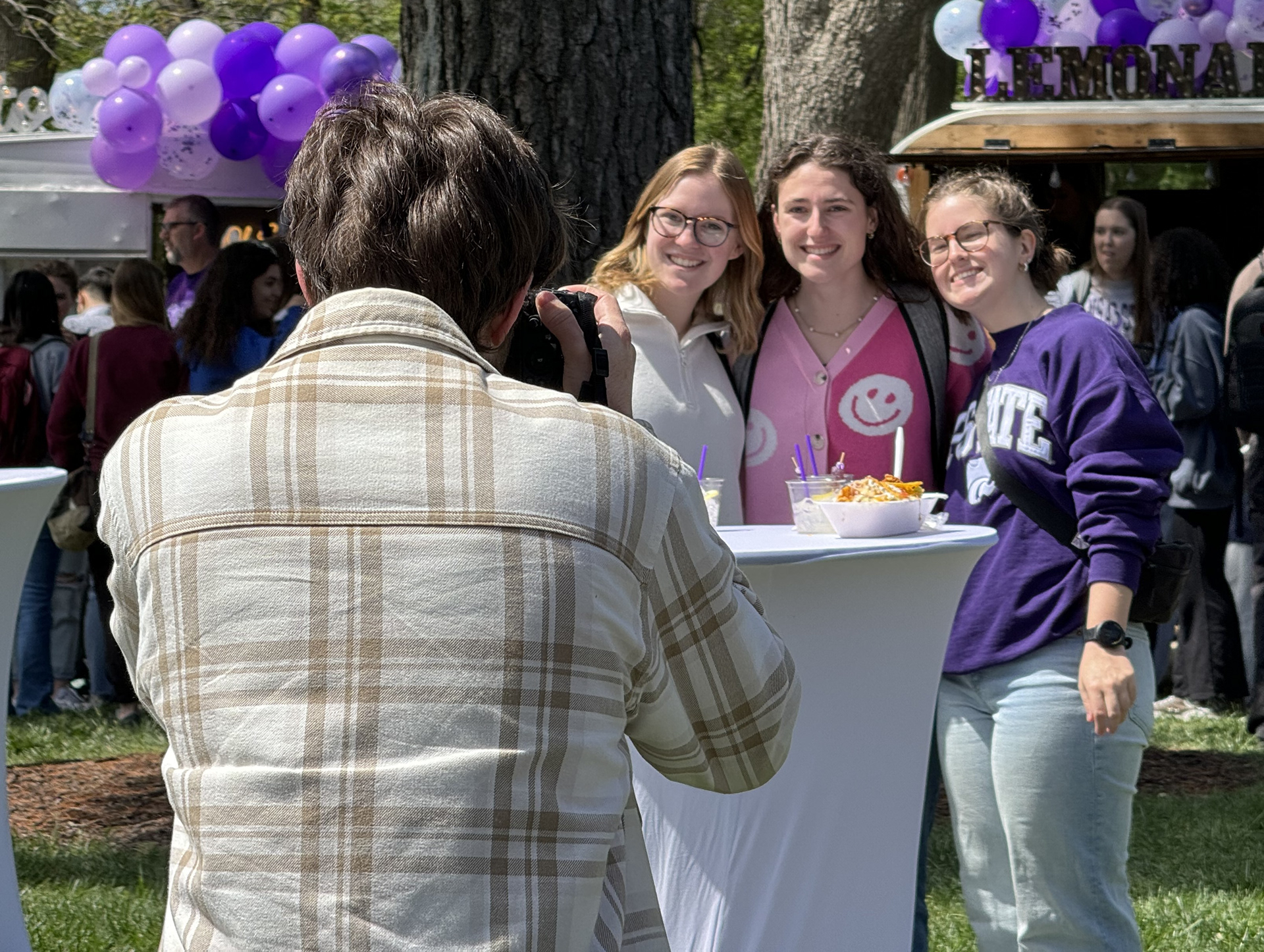 Taking photos at a K-State event of a few friends I made through the Collegian.