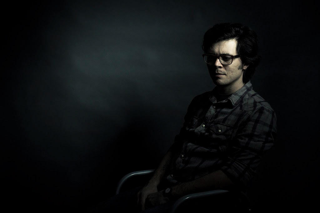 Bruno Zanardo portrait. We were assembling and testing the lights for a pregnant photoshoot and began to playto achieve  We aimed a moody image, low key and different from the average high key work that we are used to. 