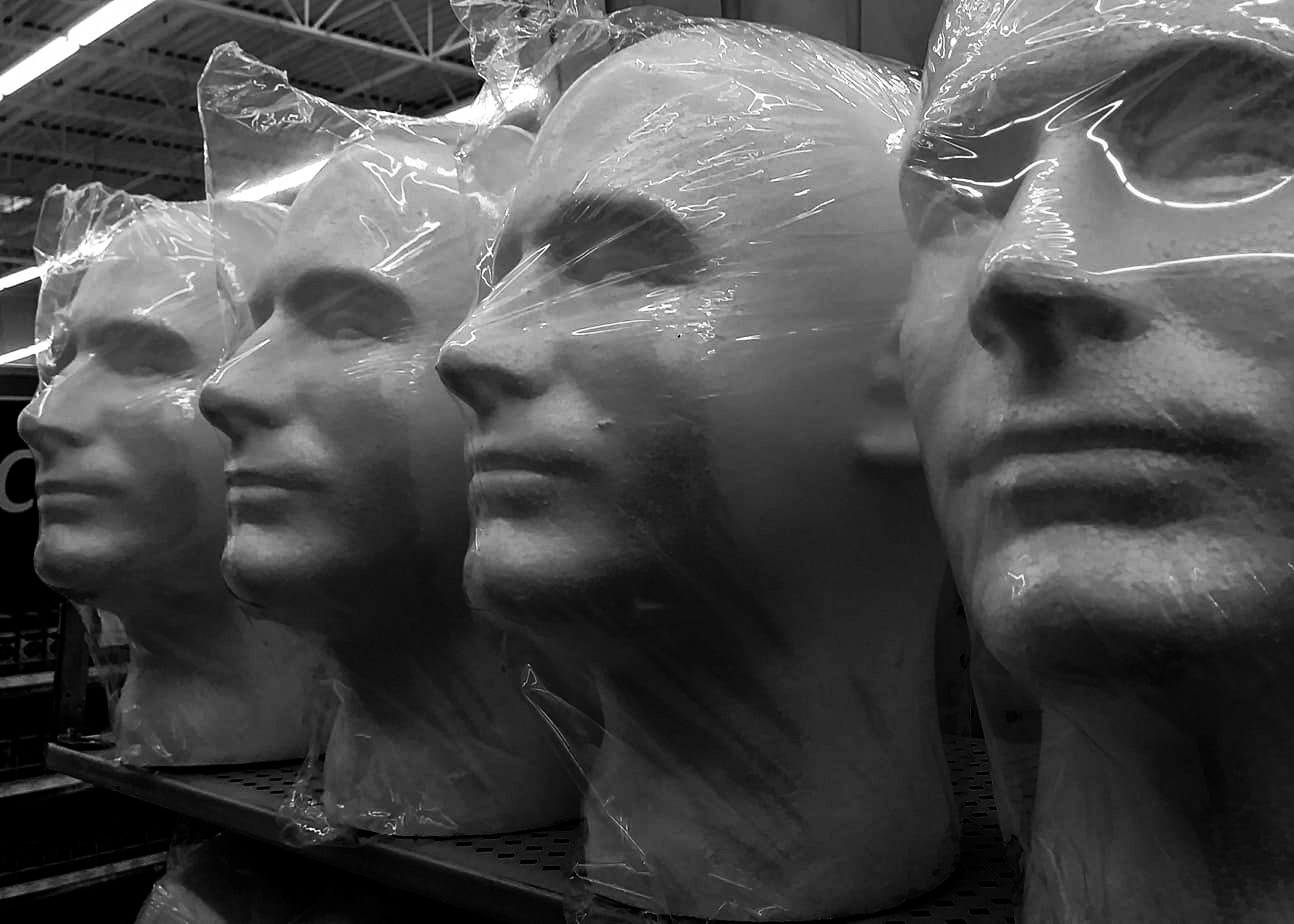 Four polystyrene heads.