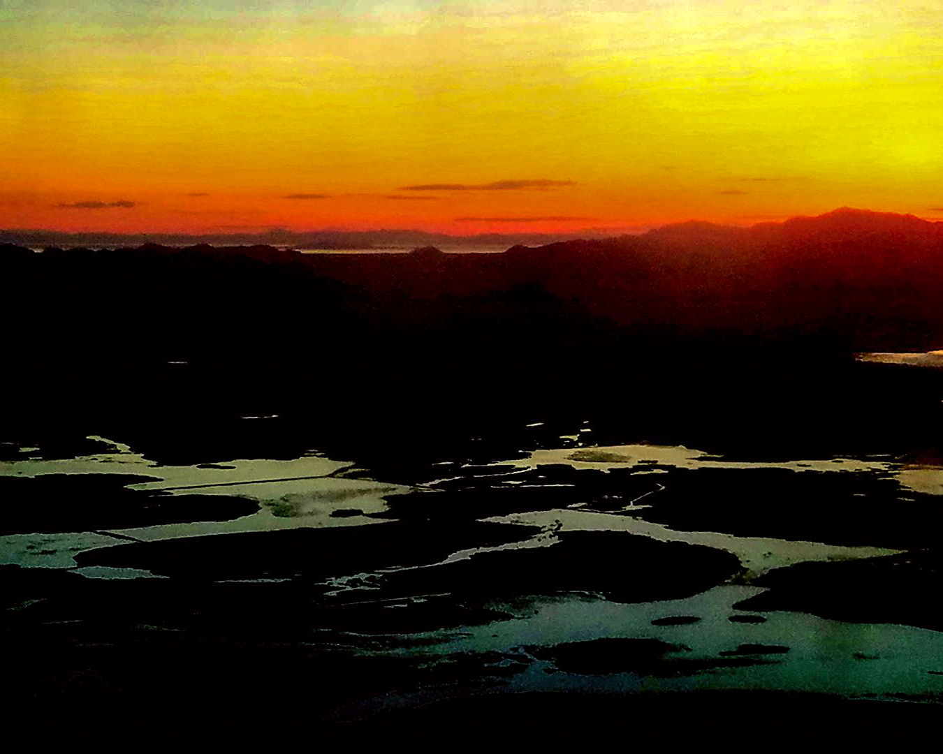Airplane window sunset.