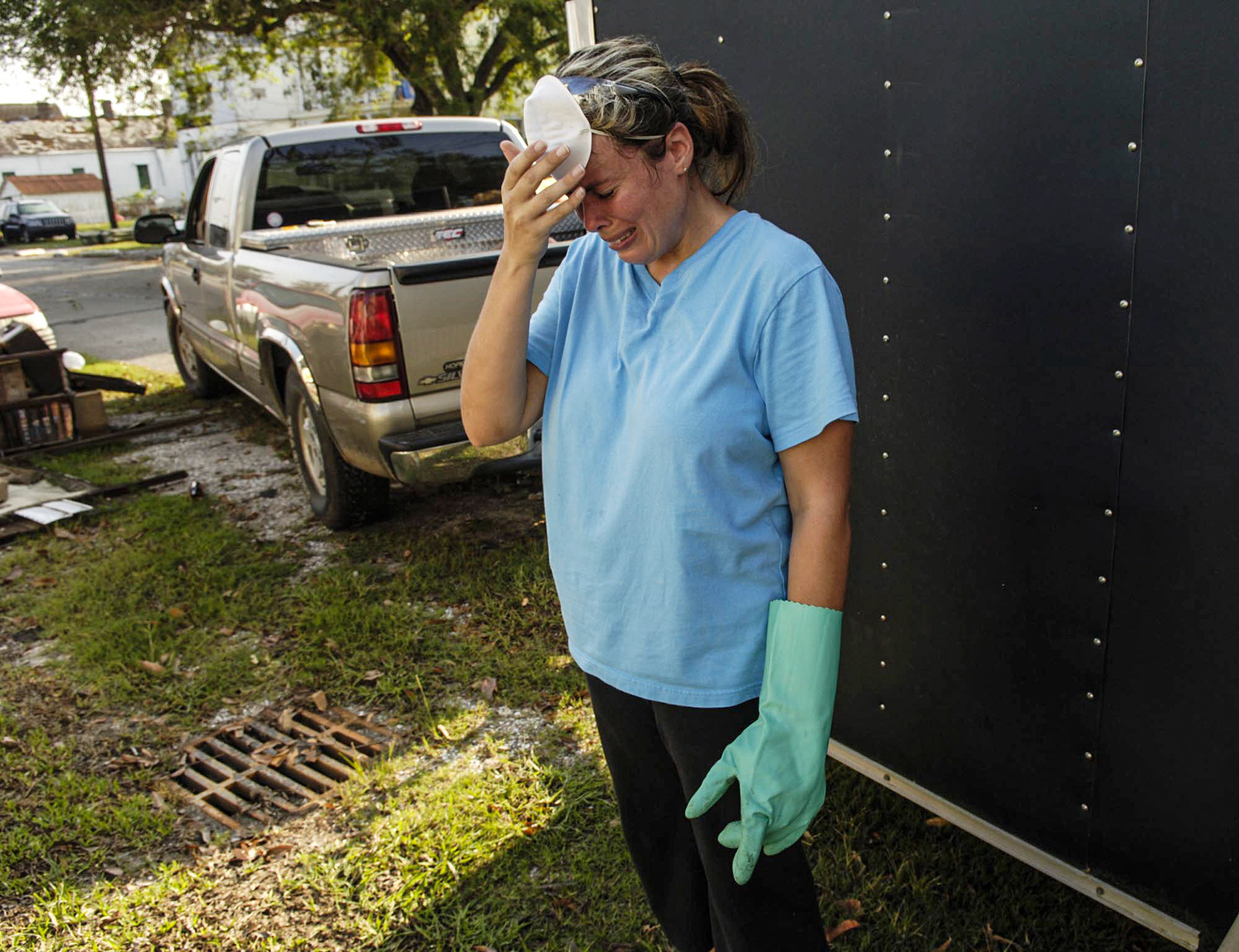 Kathy Mullet, 34 weeps at the reality of so many homes lost in St. Bernard Parish.