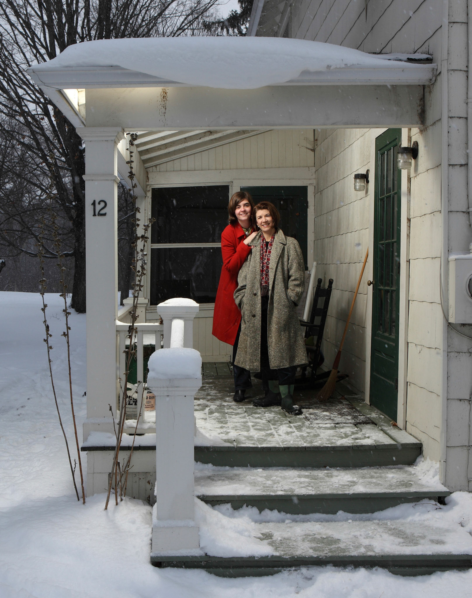 Author Amy Dickenson, right, and her daughter, Emily Mason outside their home in Freeville, New York. (ChicagoTribune)