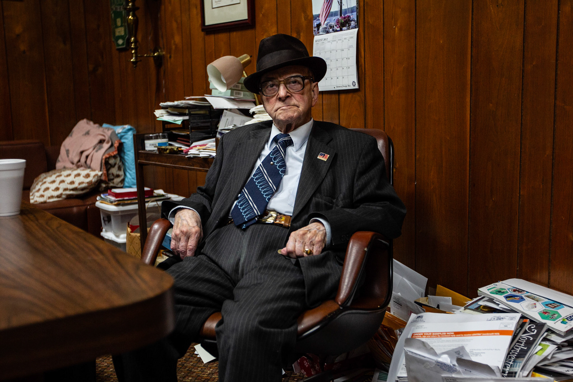 Dr. Russell Dohner poses in his office in 2012 before starting a day of patient visits.