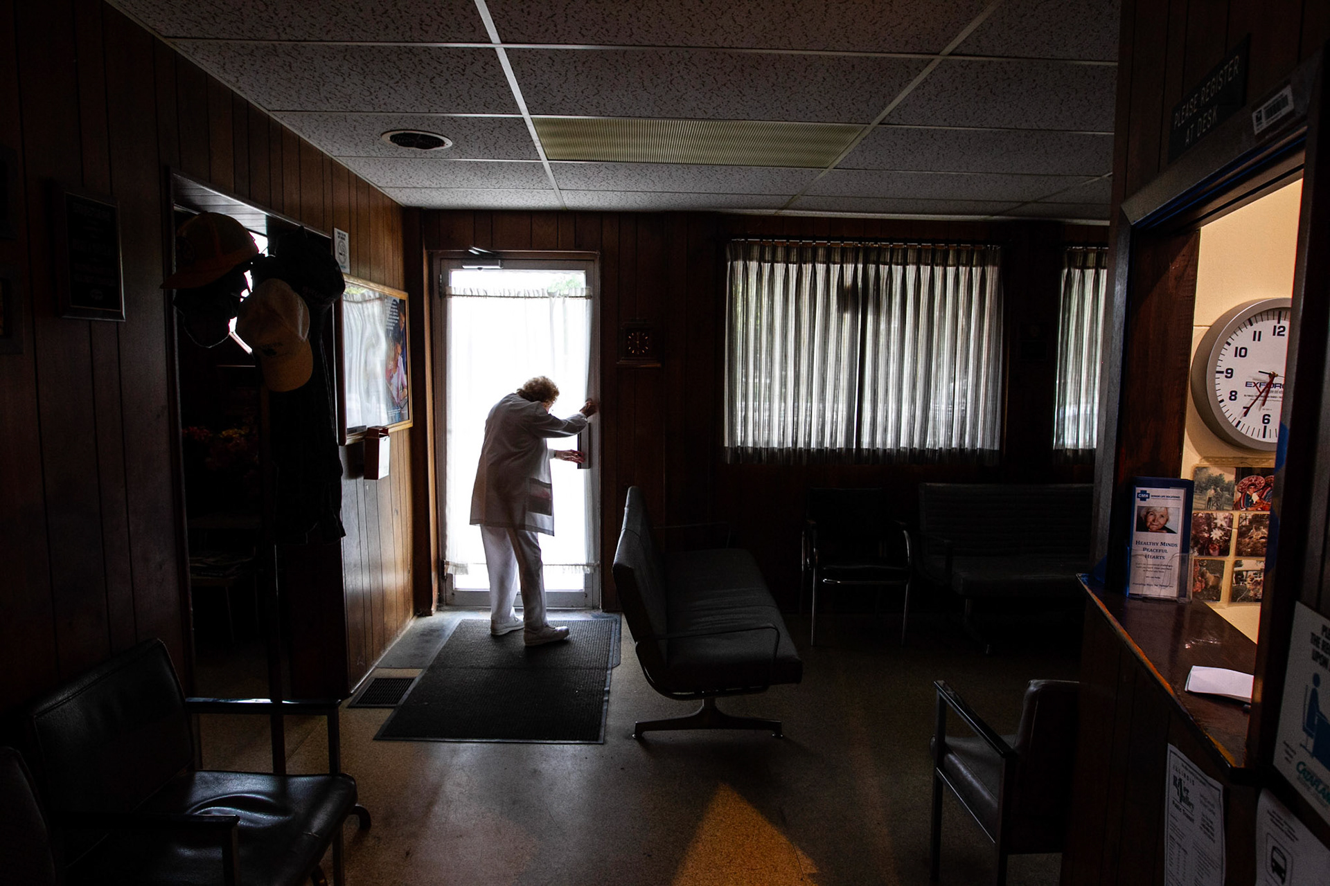 Ate 6:35 pm, nurse Florence Bottorff locks the door at the end of office hours.