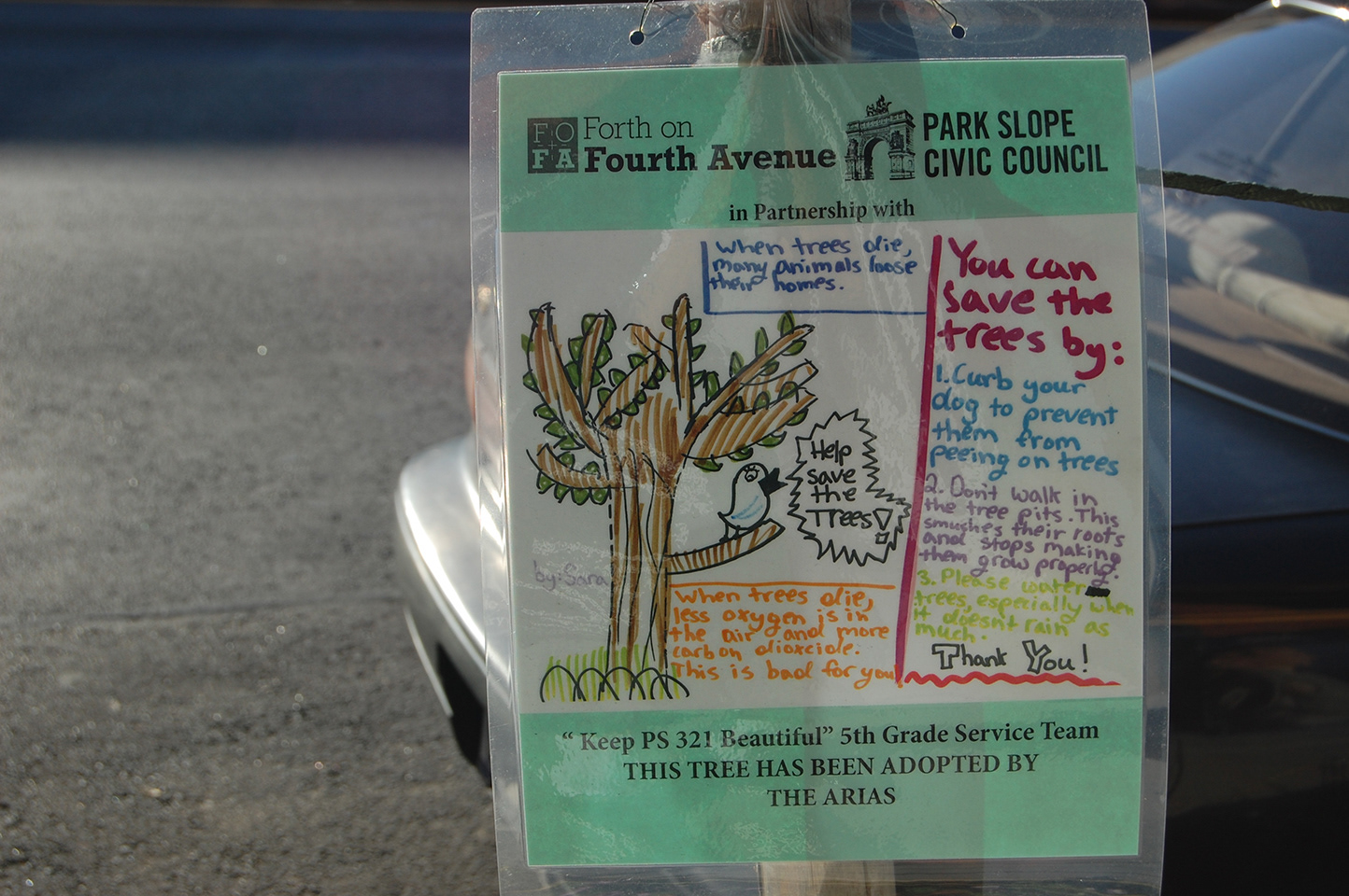 Forth on Fourth Avenue tree-bed sign