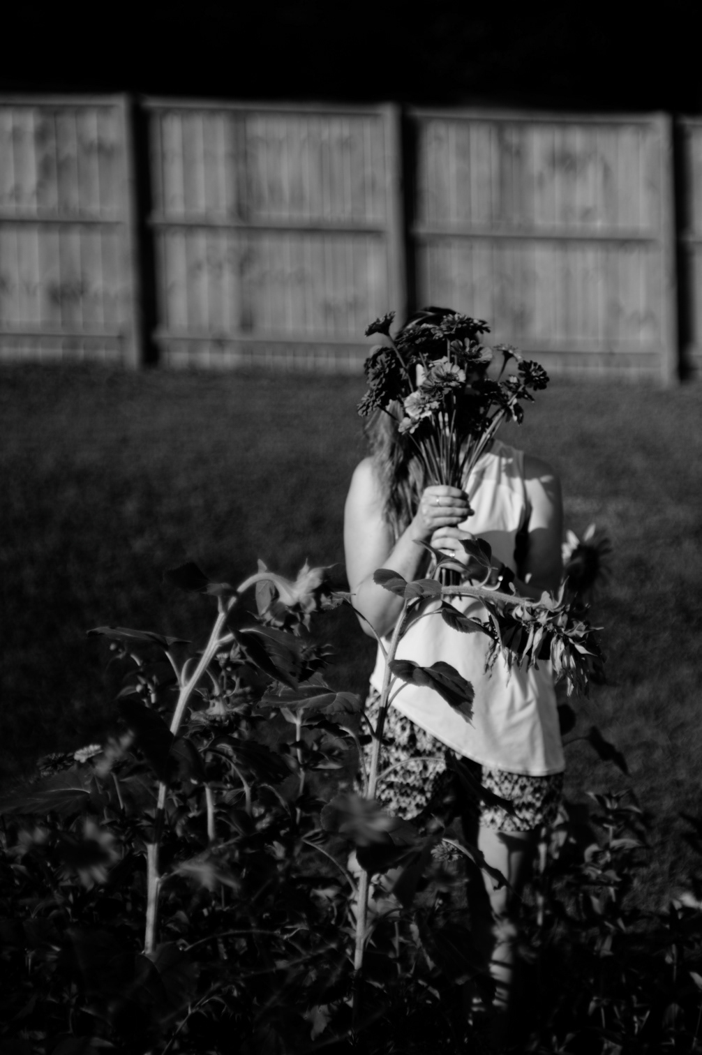 Whispers linger in the cracks of time, Your name etched deep, forever mine. Echoes of a life too brief, A love beyond this endless grief. 