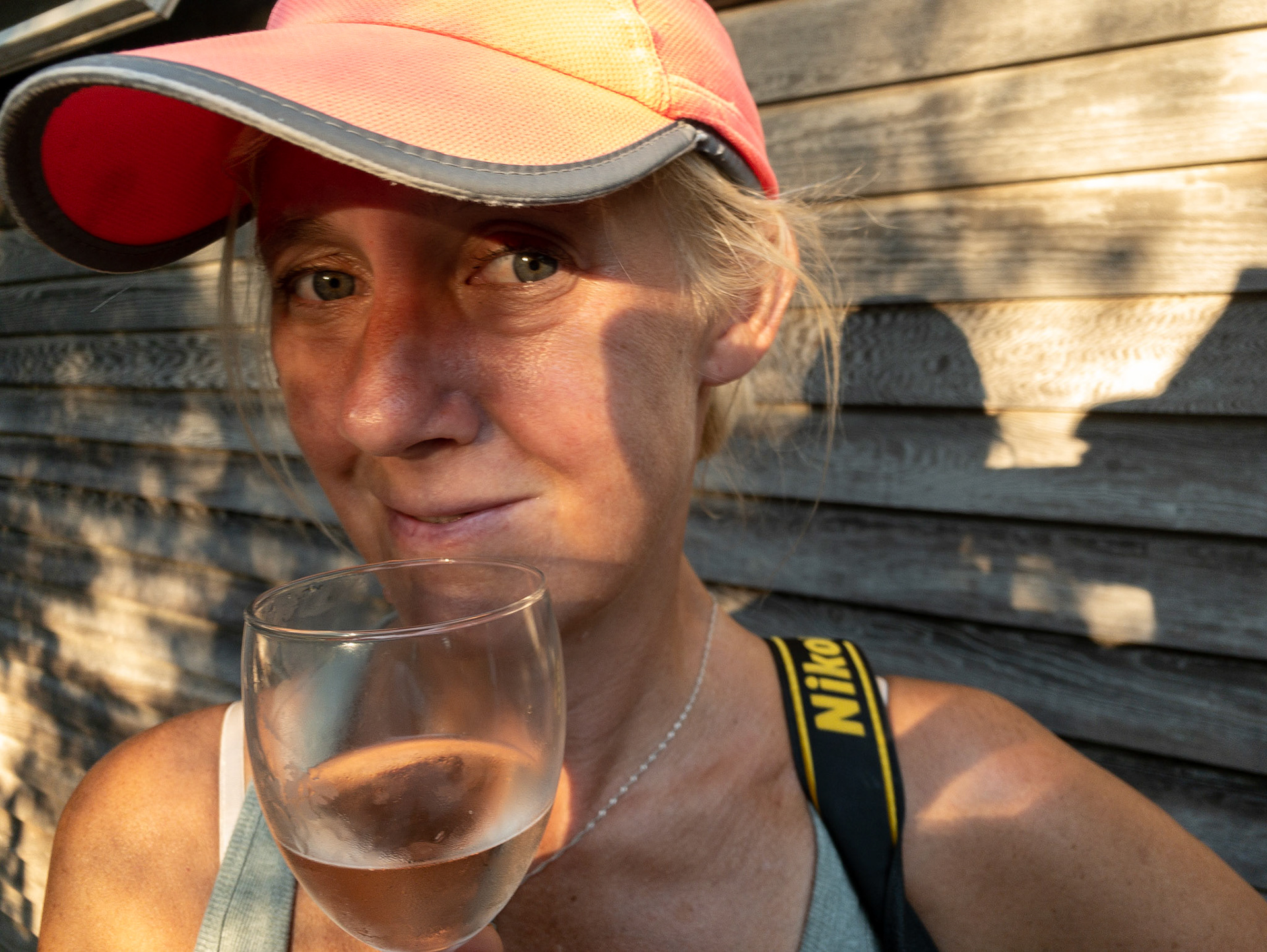 Wellfleet, Ma, August 2020:  Joanne Smith in front of an artist cottage  on Cape Cod.