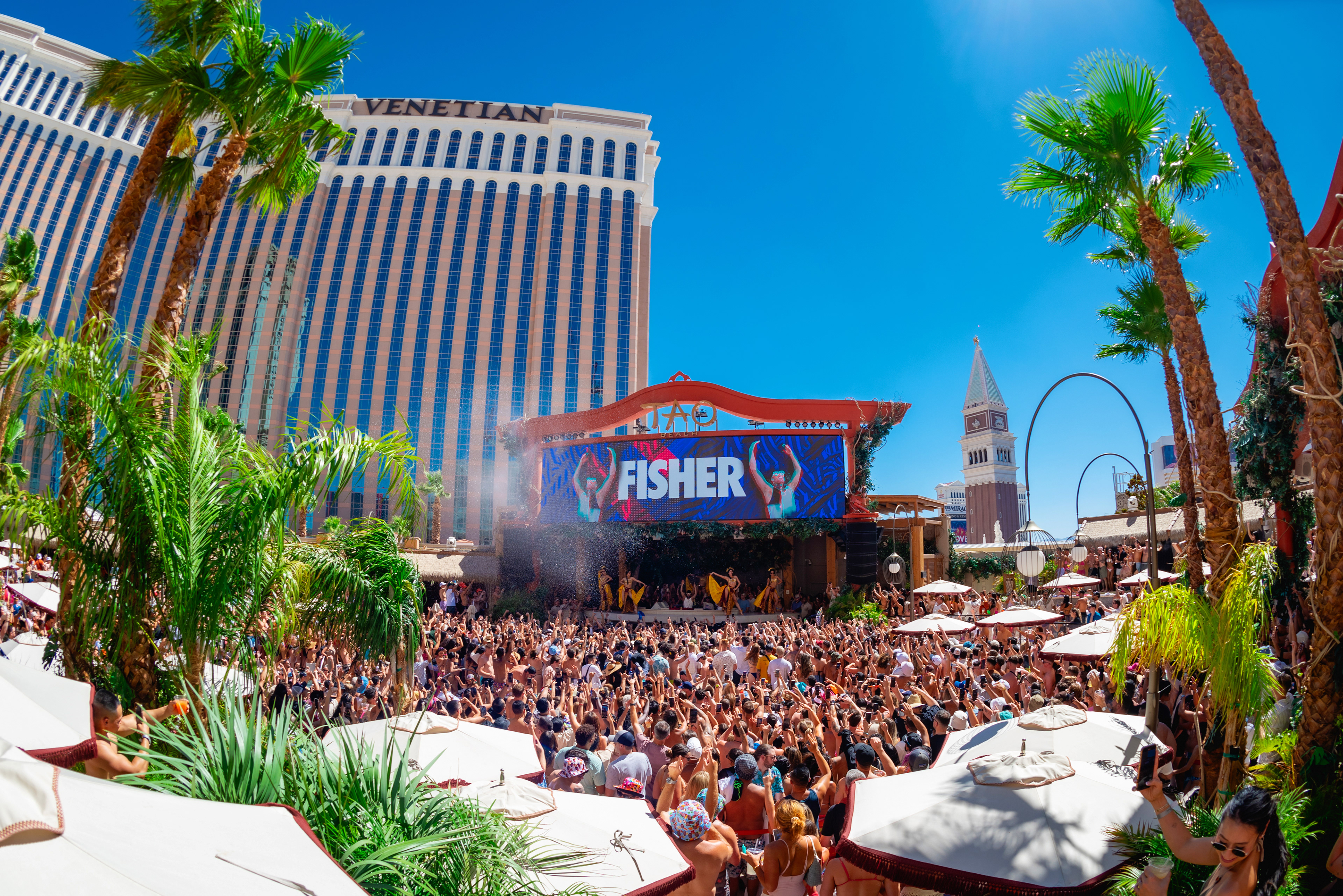 Fisher performing at Tao Beach in Las Vegas