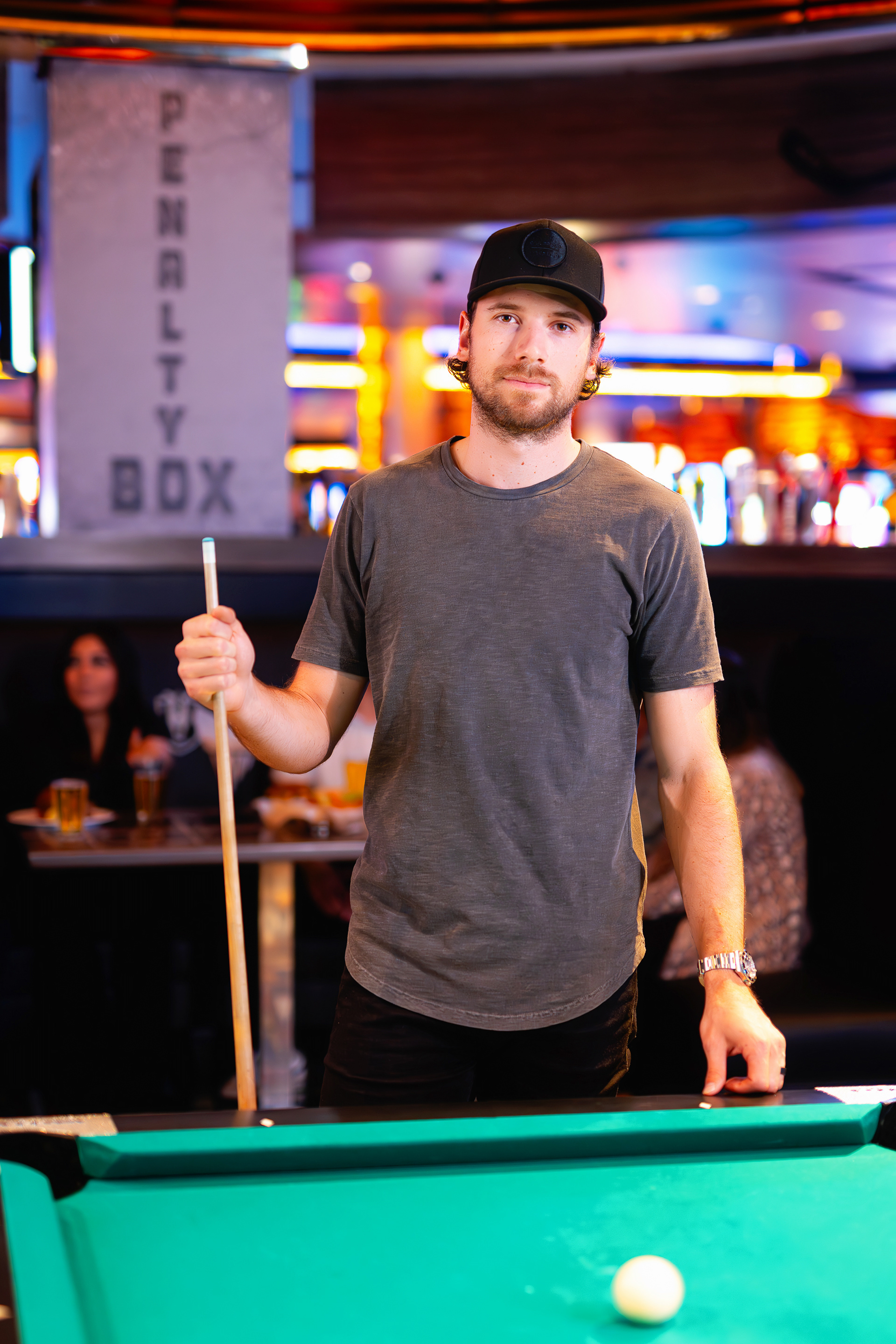 Shea Theodore of the Vegas Golden Knights posing at the M Resort for billboard marketing materials